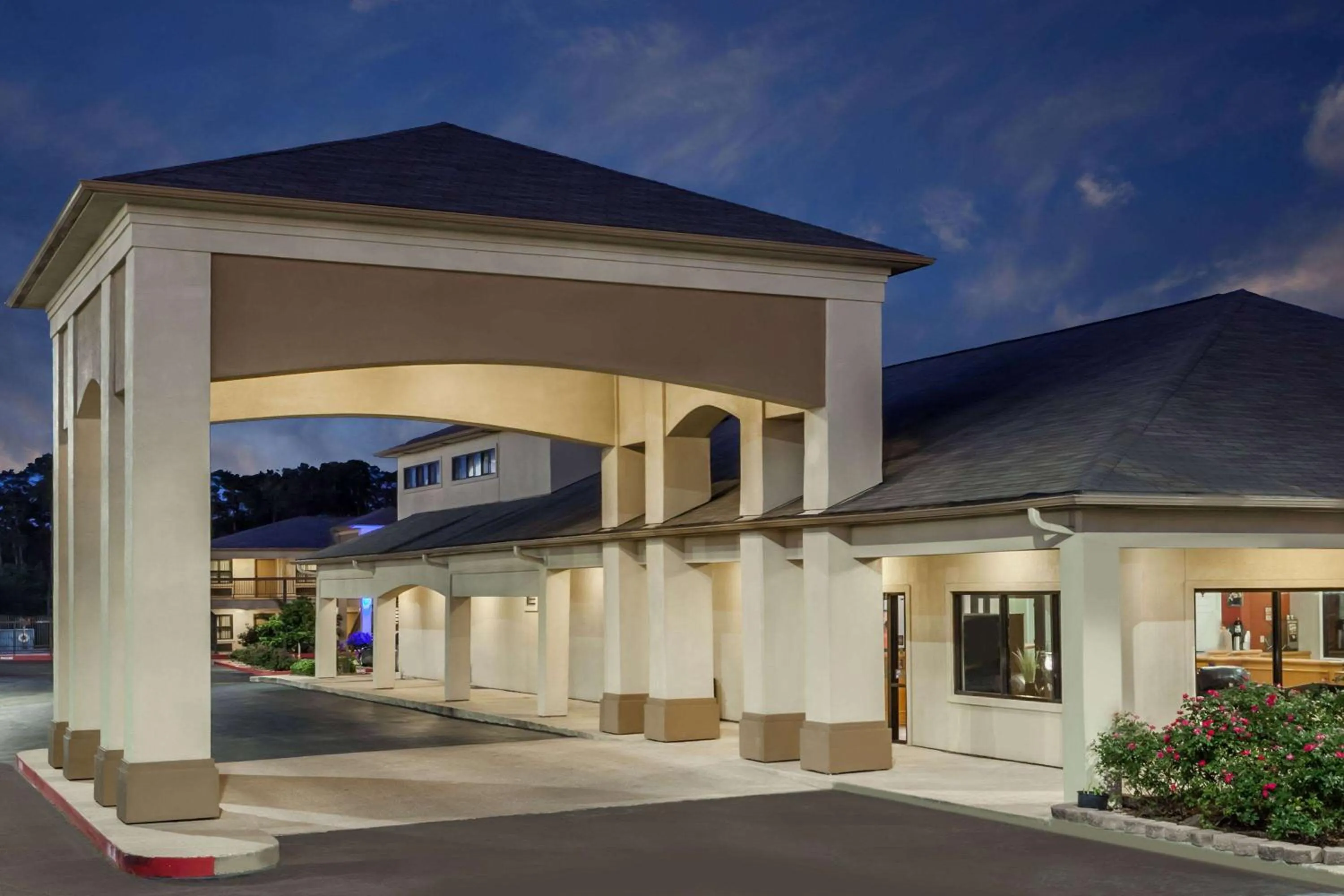 Property building in Days Inn & Suites by Wyndham Huntsville