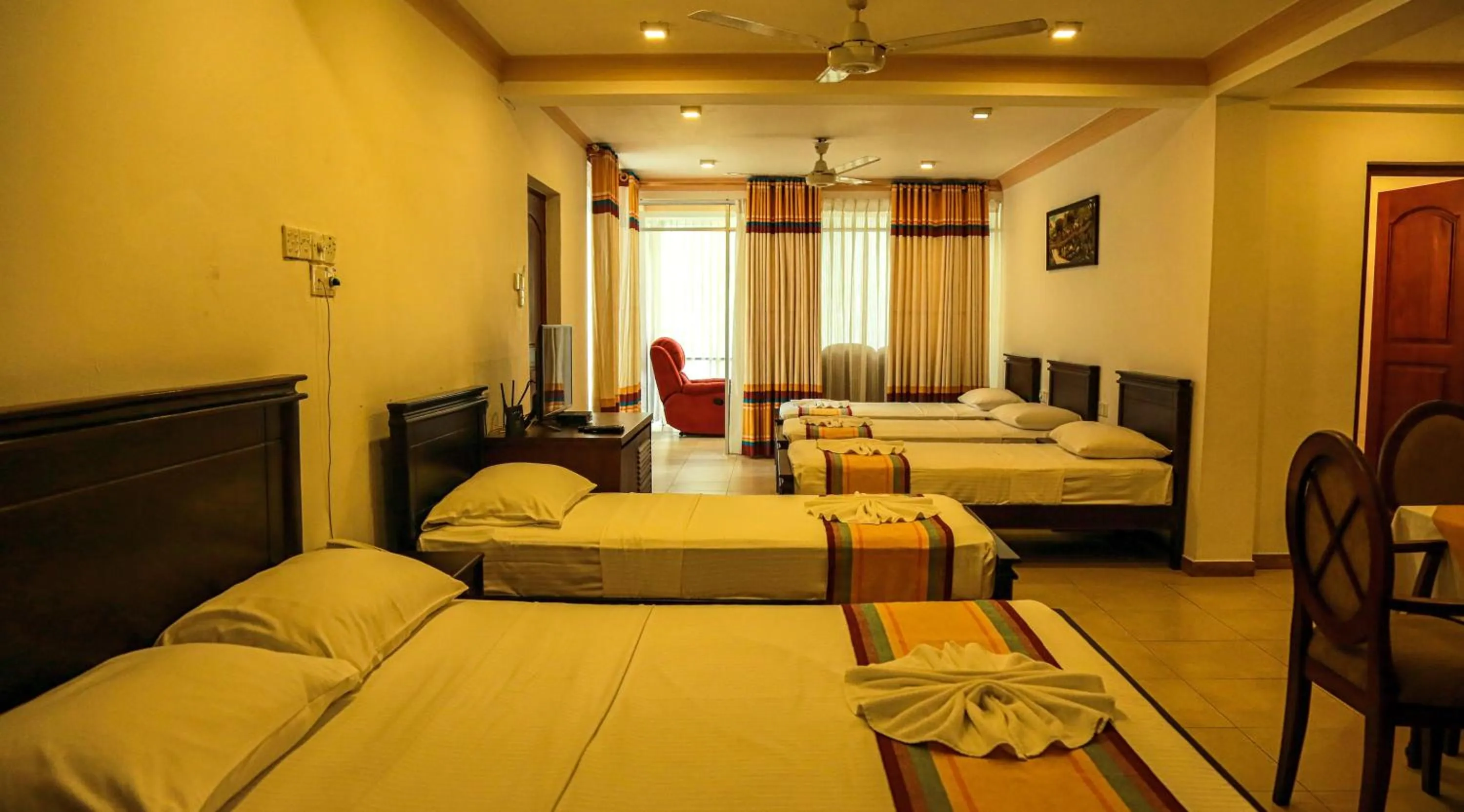 Bed in Oak Ray Serene Garden Hotel