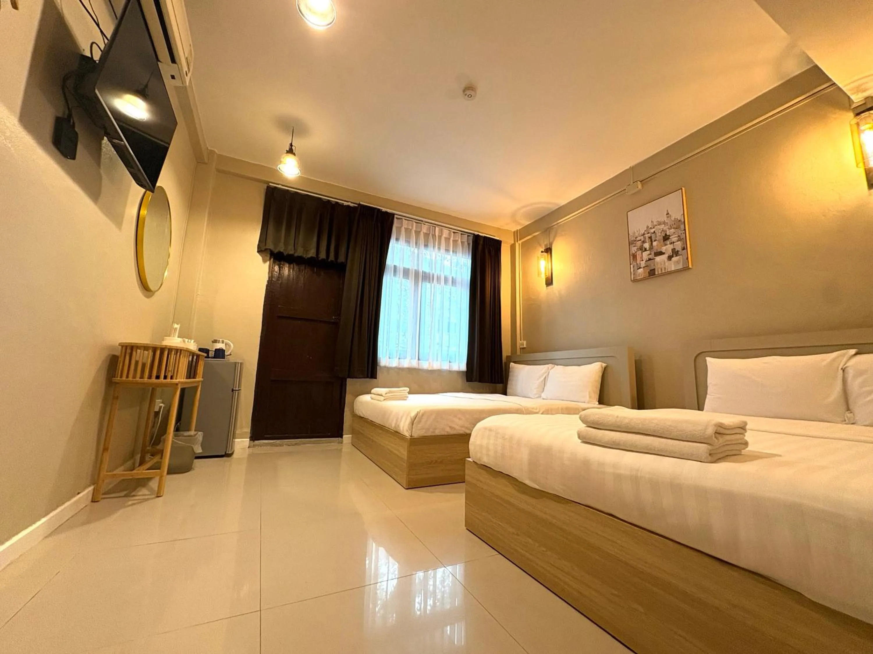 Bed in At Hua Lamphong Hotel