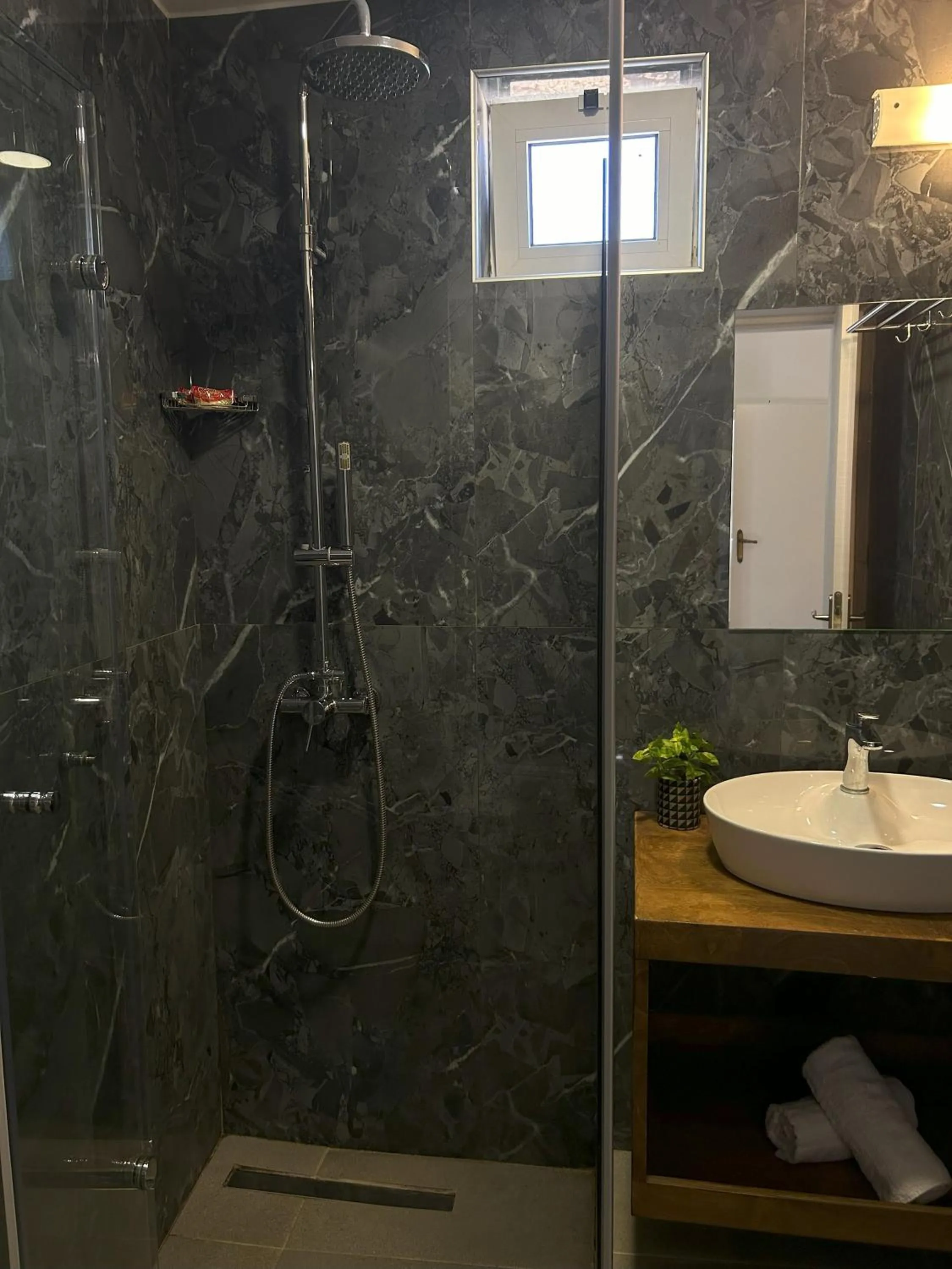 Bathroom in Naiades Almiros Hotel