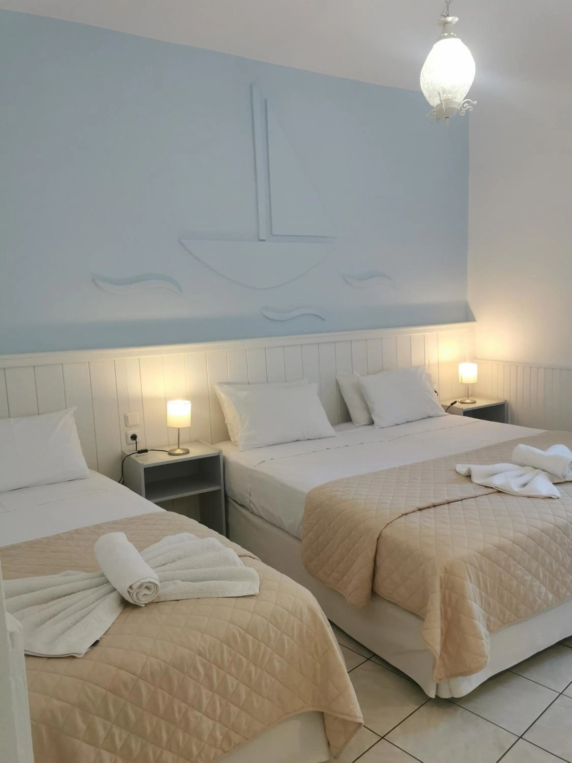 Bed in Naiades Almiros Hotel