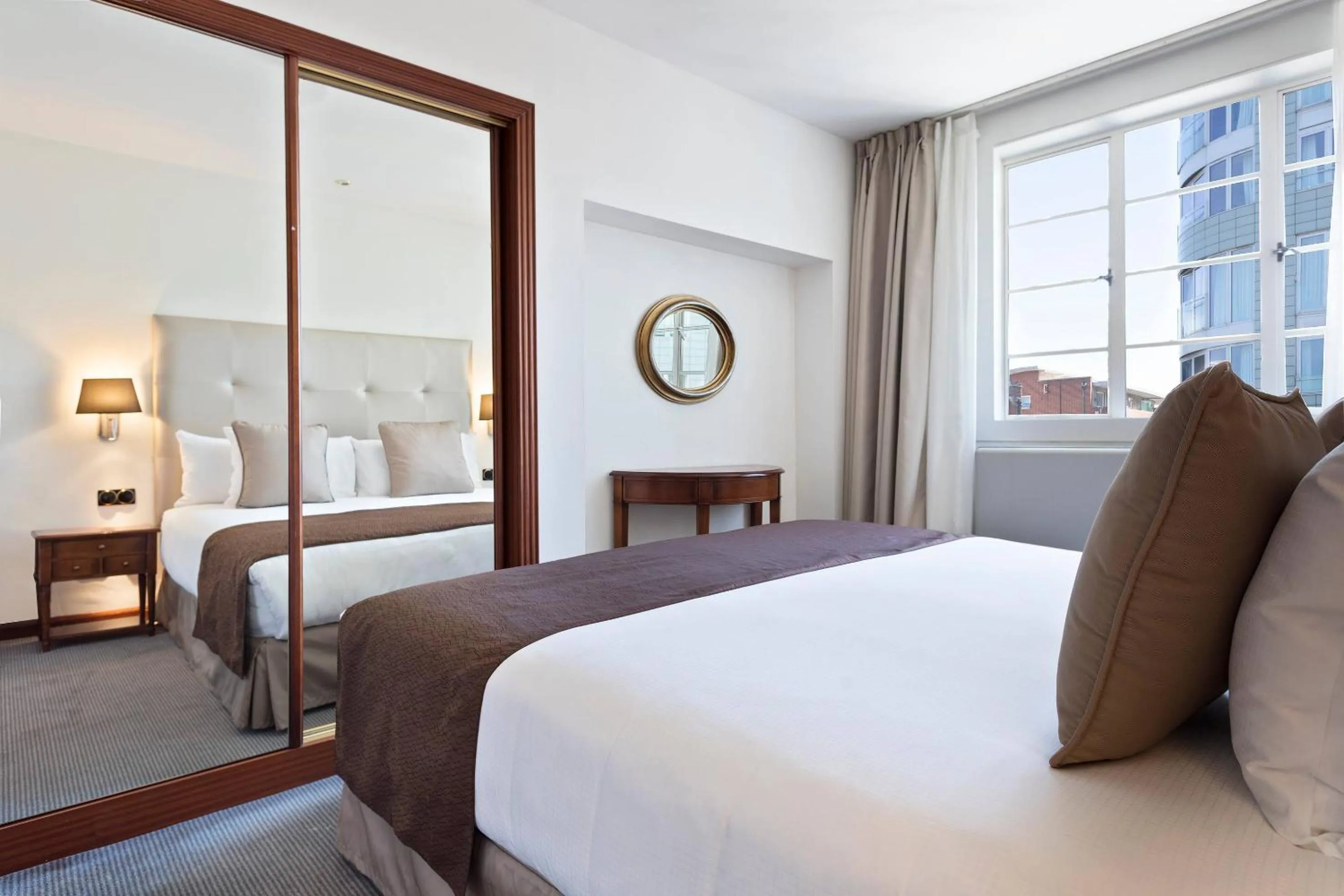 Bed in Meliá White House Apartments