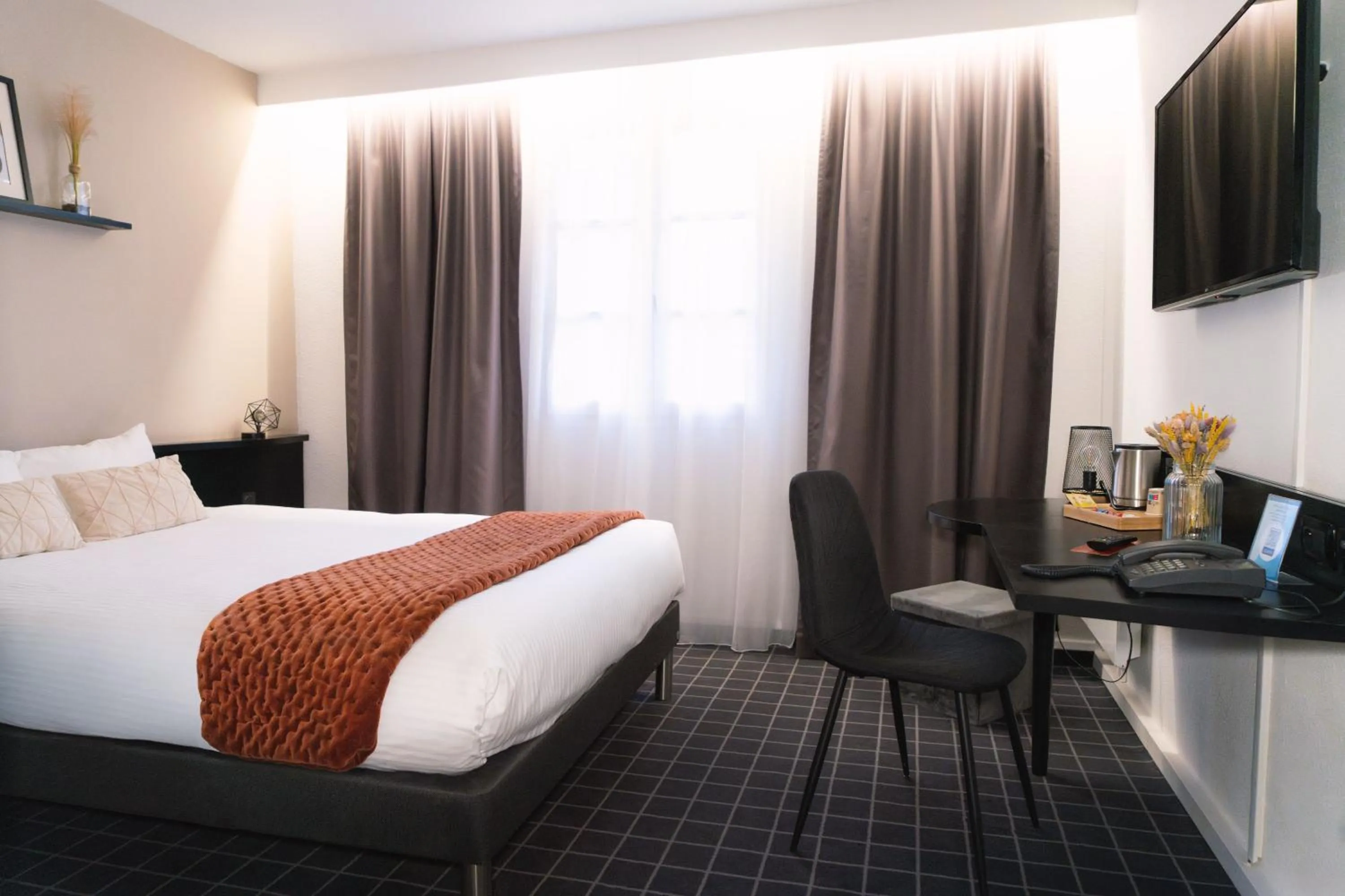 Bed in Hôtel du Beffroi Gravelines Dunkerque