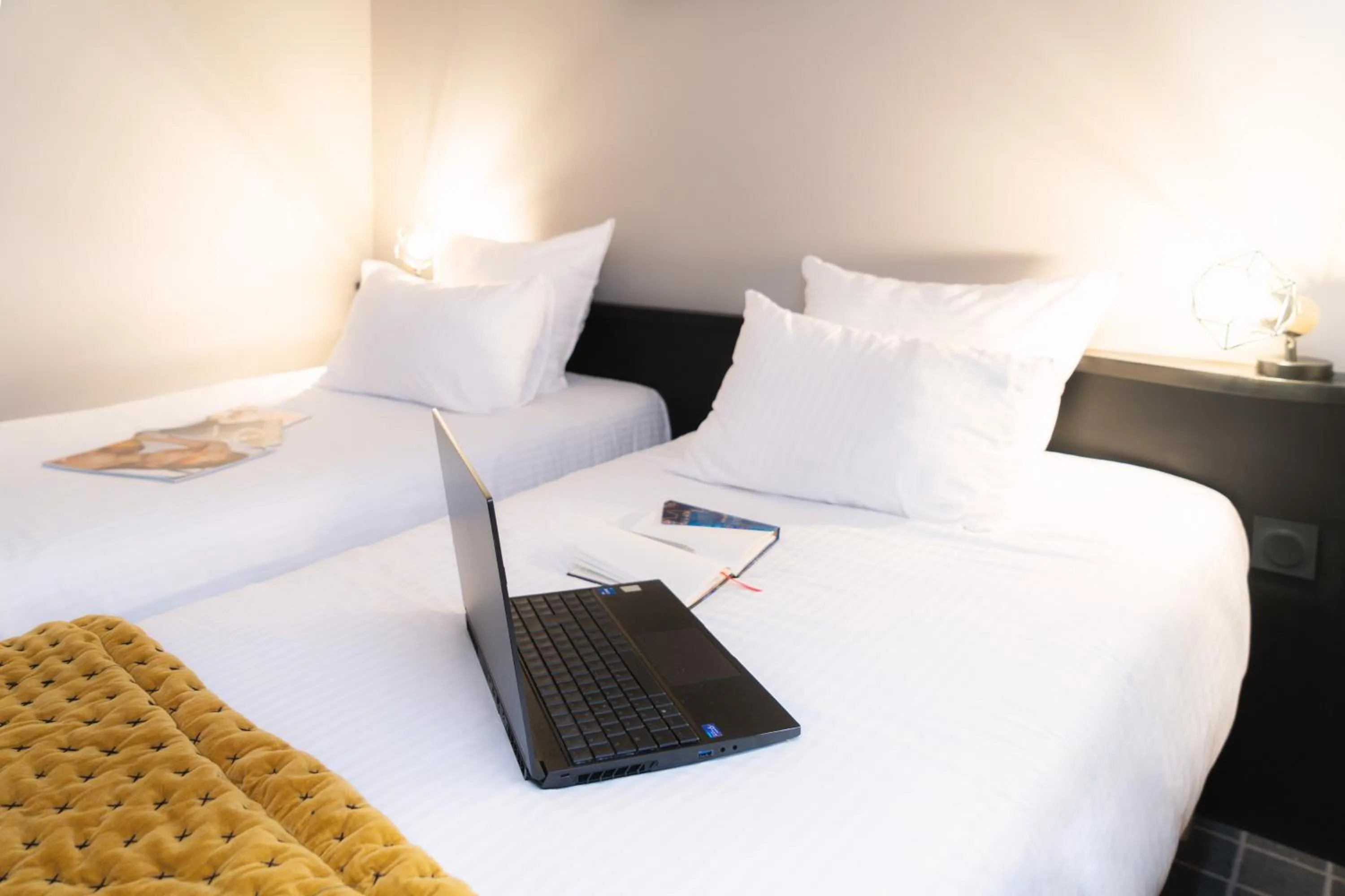Bed in Hôtel du Beffroi Gravelines Dunkerque