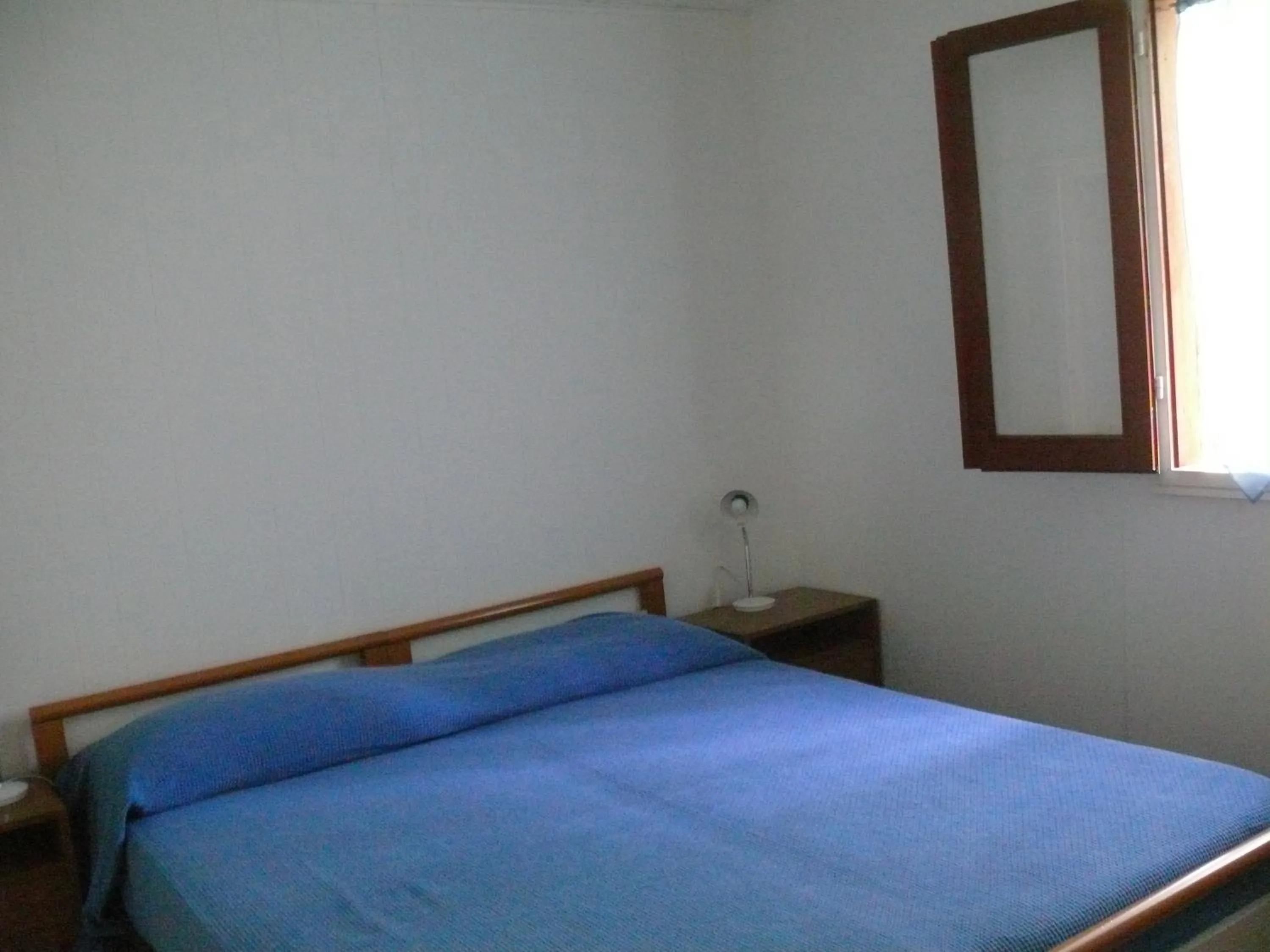 Photo of the whole room, Bed in Residence Il Fortino