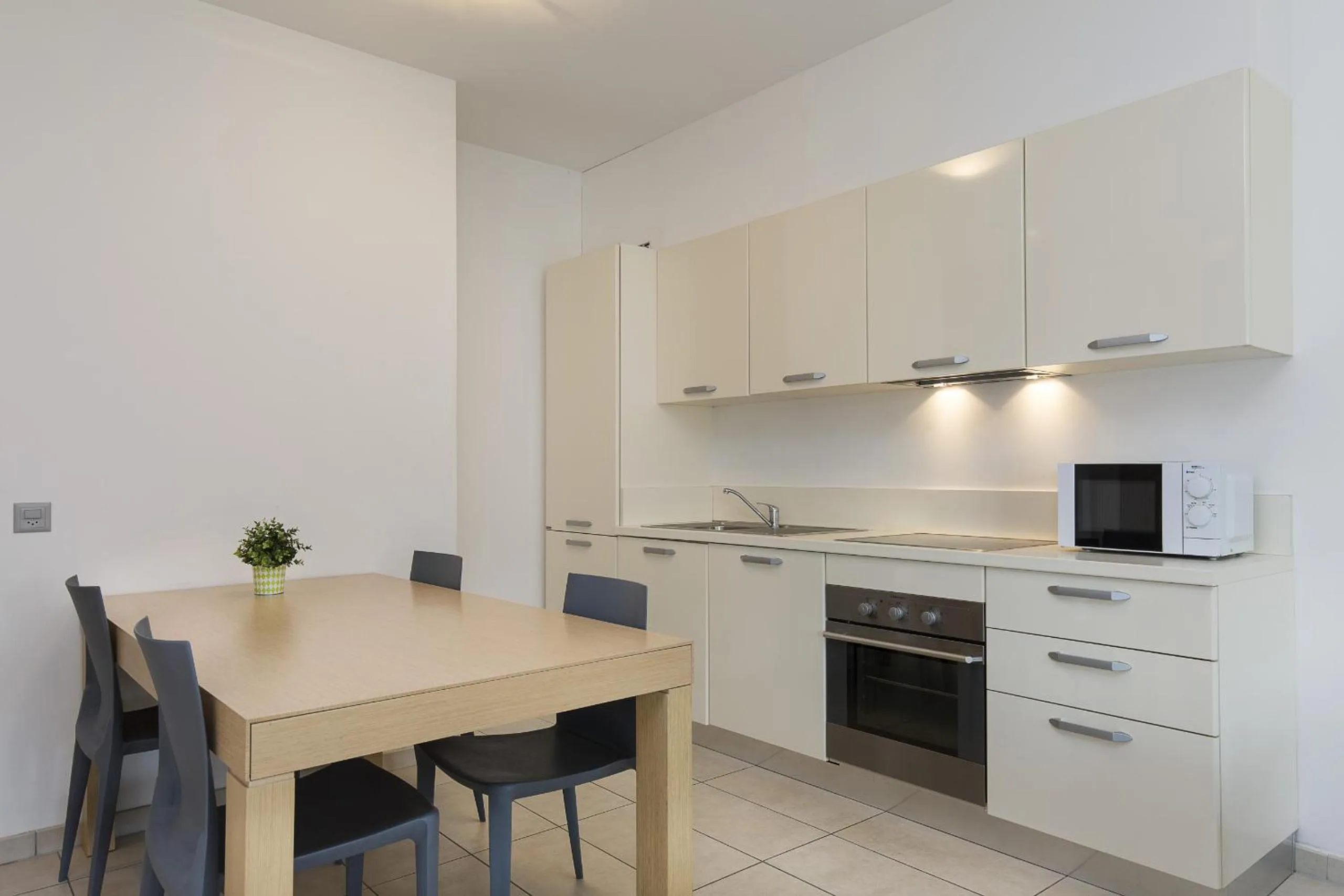 Kitchen or kitchenette in Prestige Apartments by Quokka 360 - spacious flats with terraces