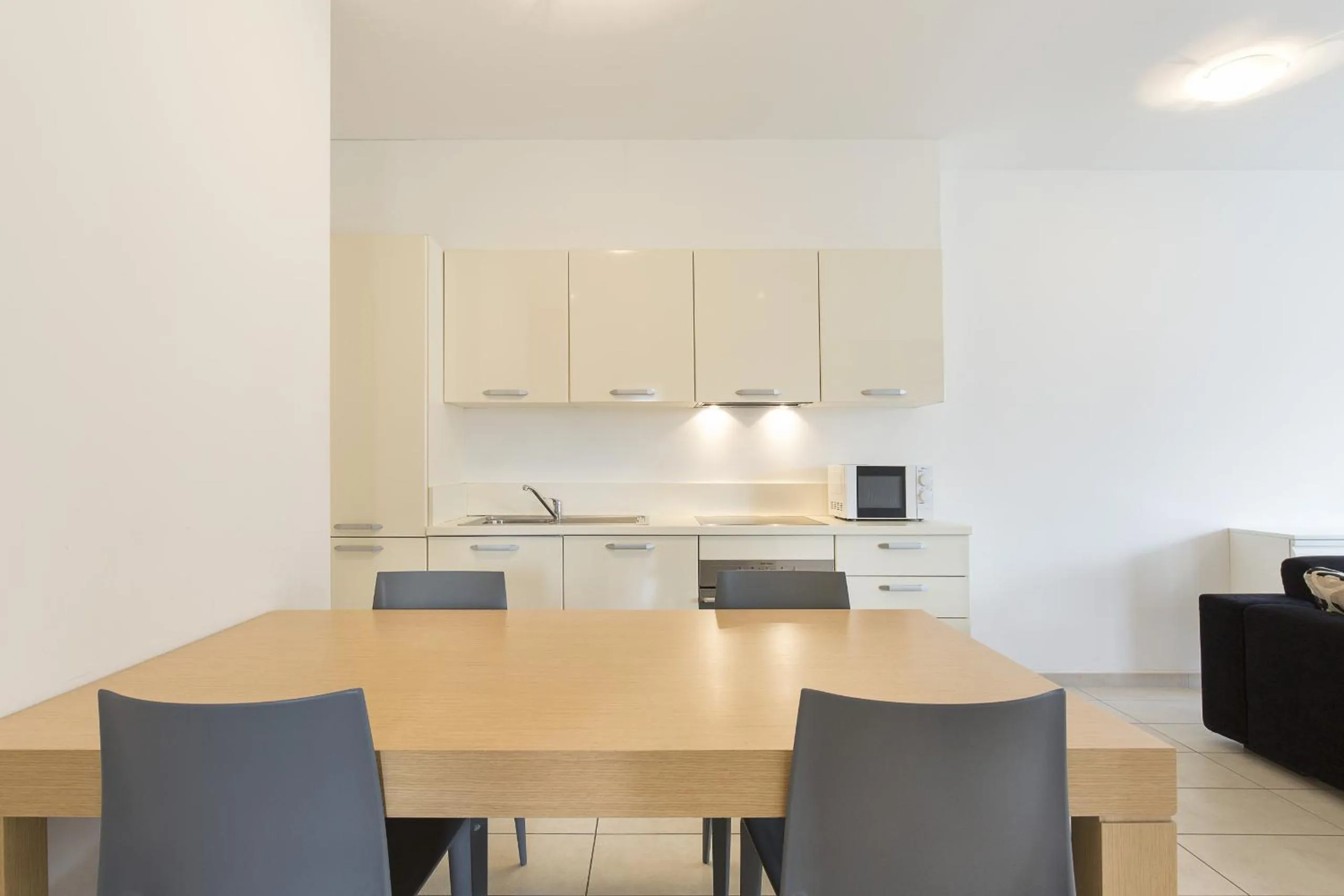 Kitchen or kitchenette in Prestige Apartments by Quokka 360 - spacious flats with terraces