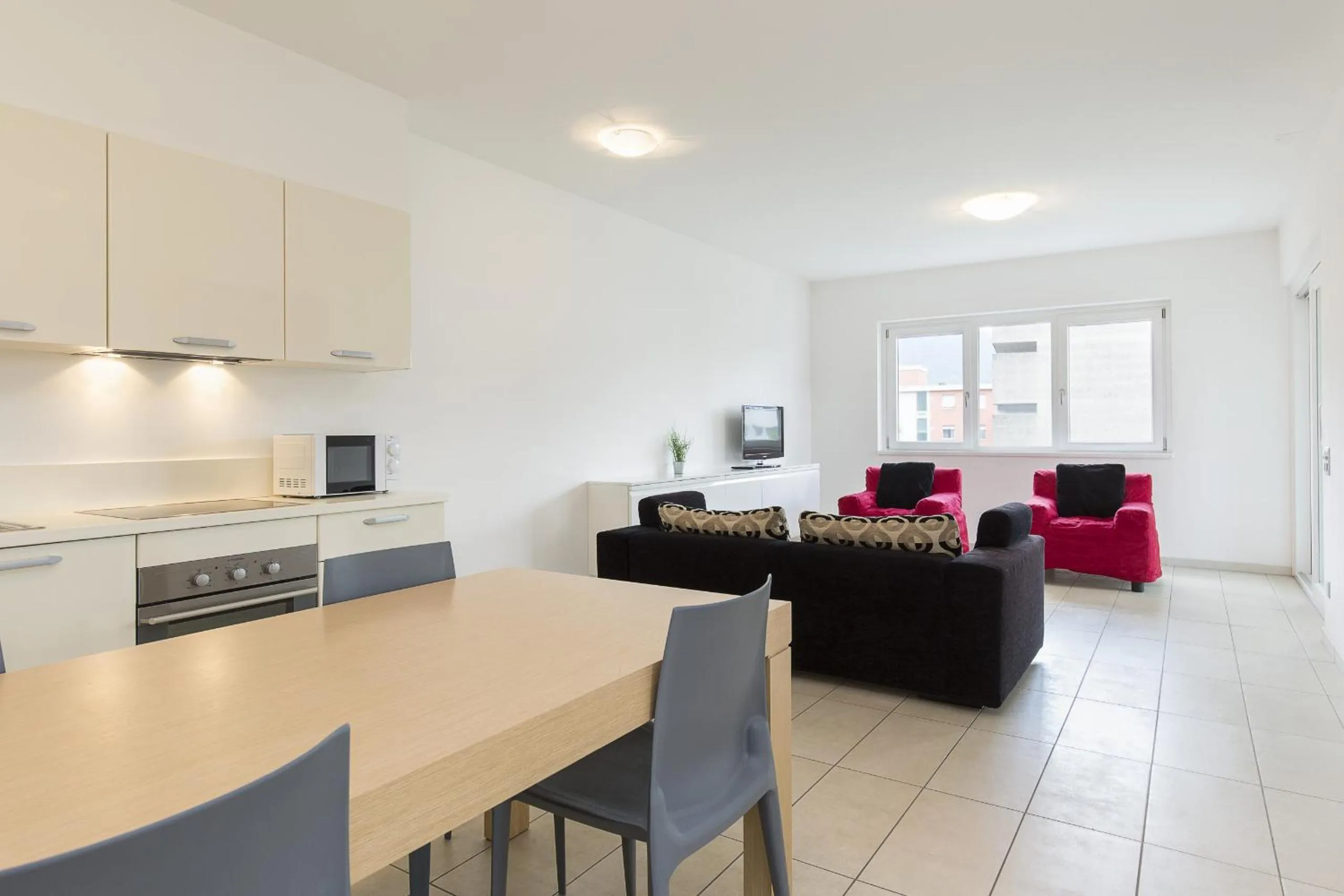 Kitchen or kitchenette in Prestige Apartments by Quokka 360 - spacious flats with terraces