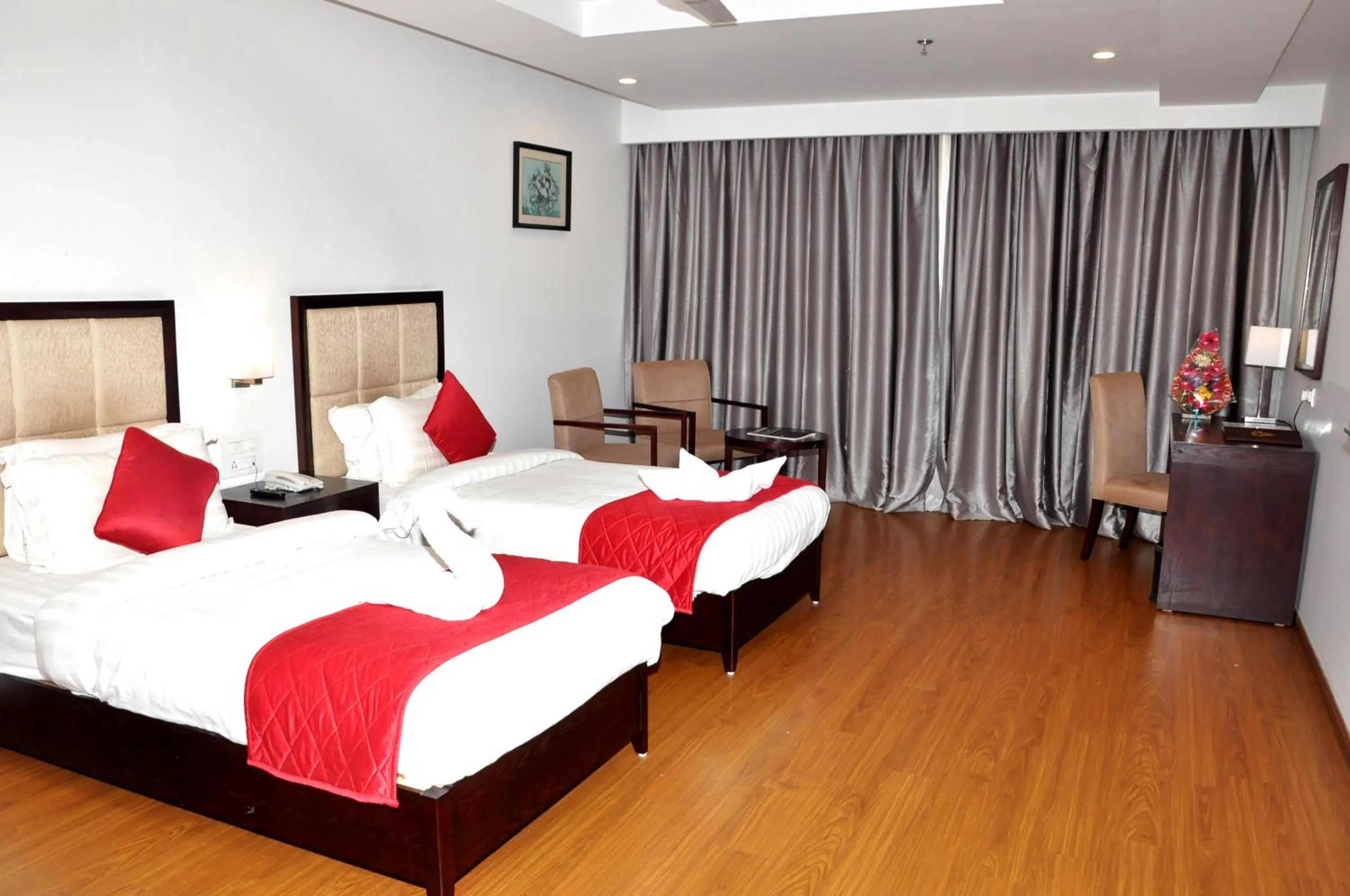 Bedroom, Bed in Triguna Clarks Inn Kurnool