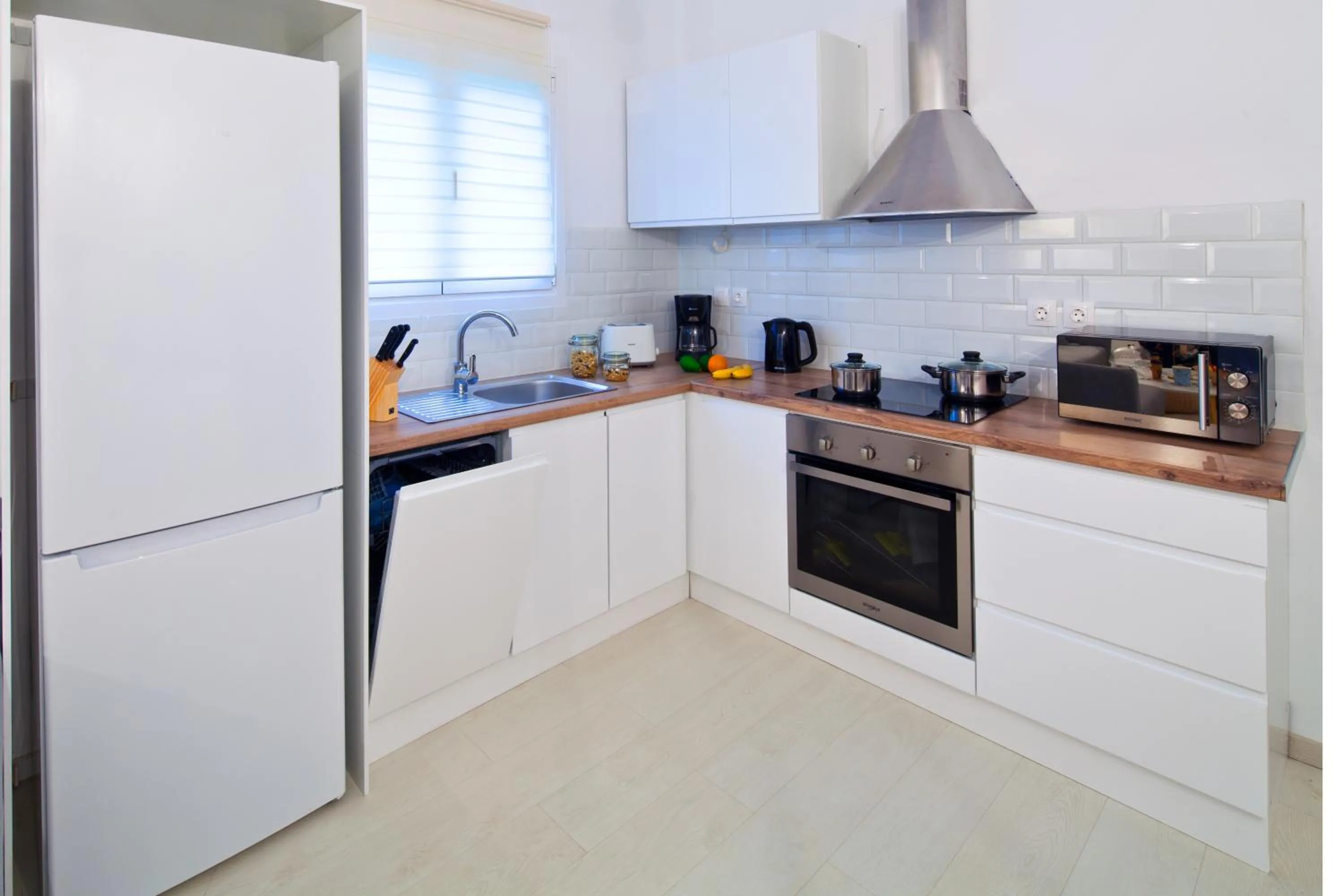 Kitchen or kitchenette in Sun 'n Chill, Boutique Apartments & Beach Villa