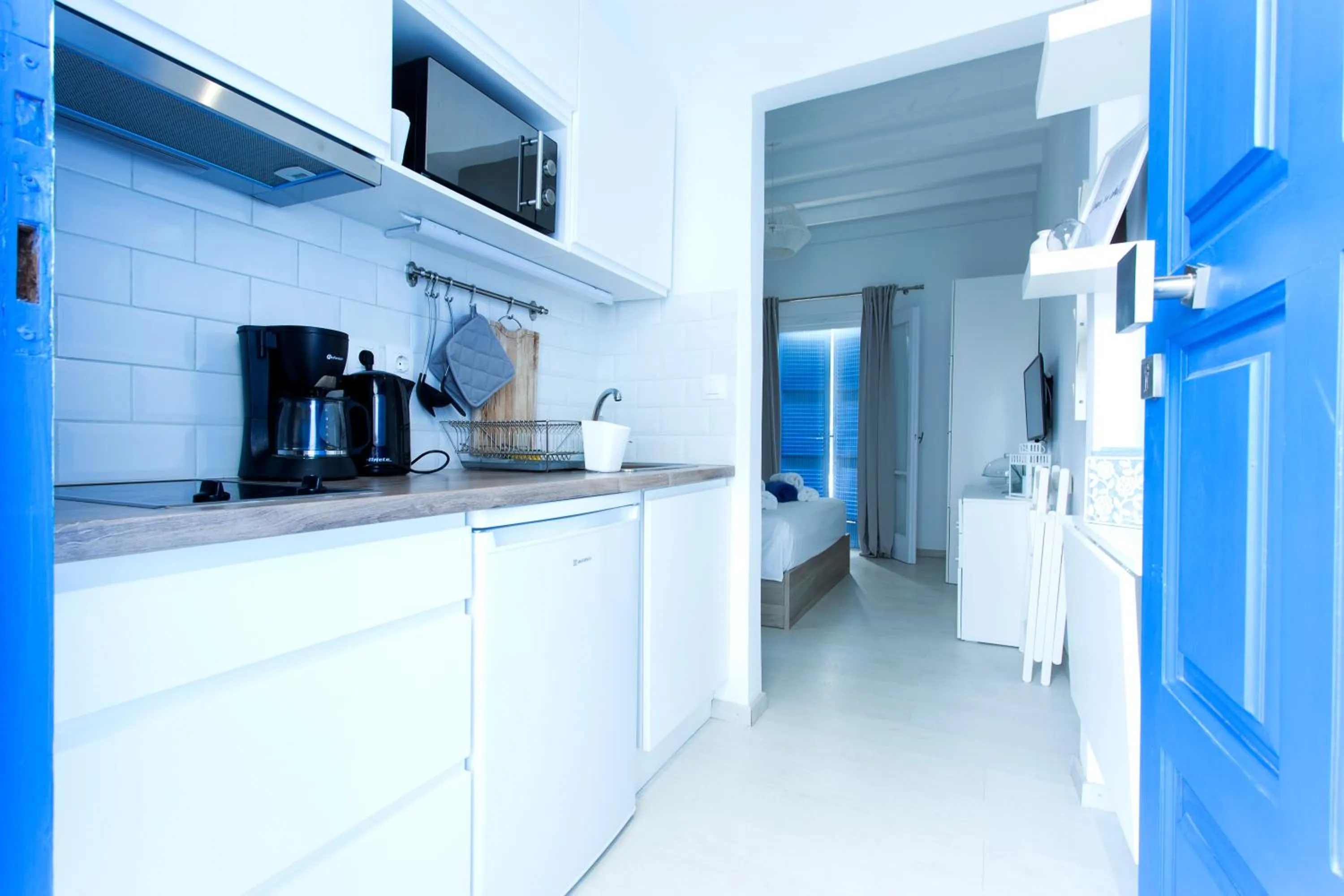 Kitchen or kitchenette in Sun 'n Chill, Boutique Apartments & Beach Villa
