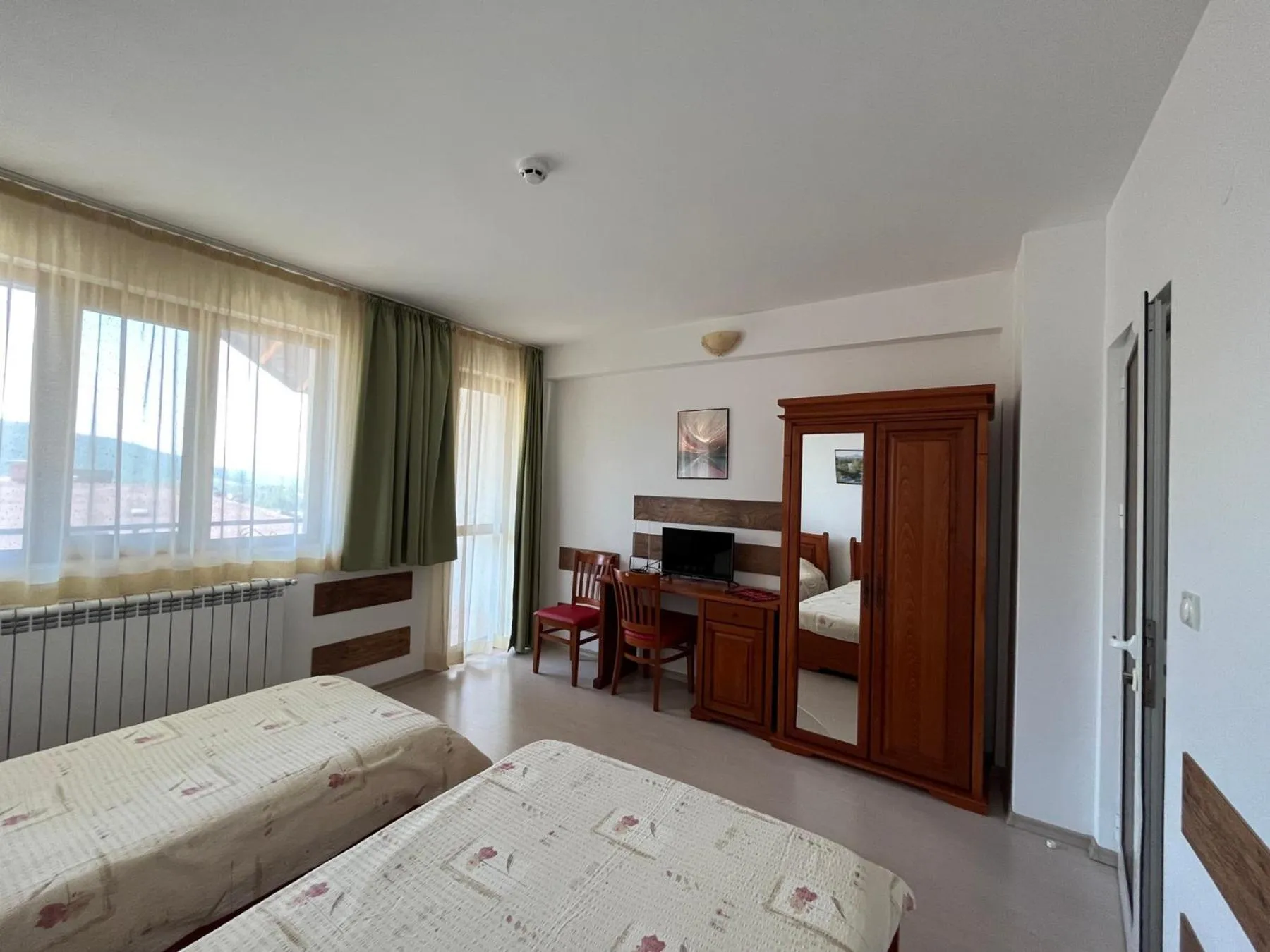 Bed in Centaur Family Hotel