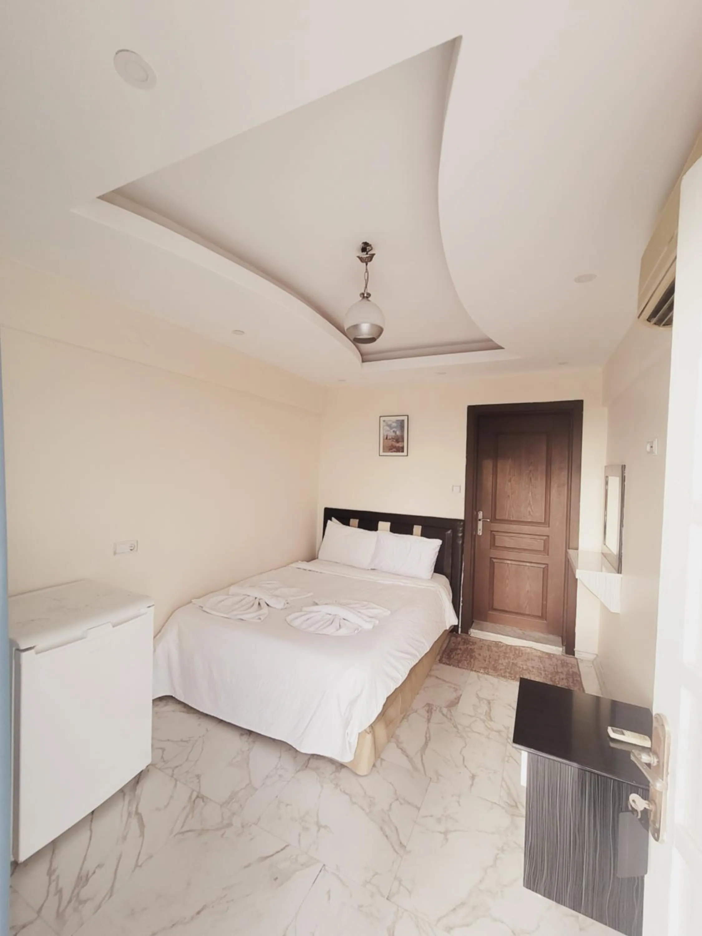 Bed in shah sultan Ozturk Hotel