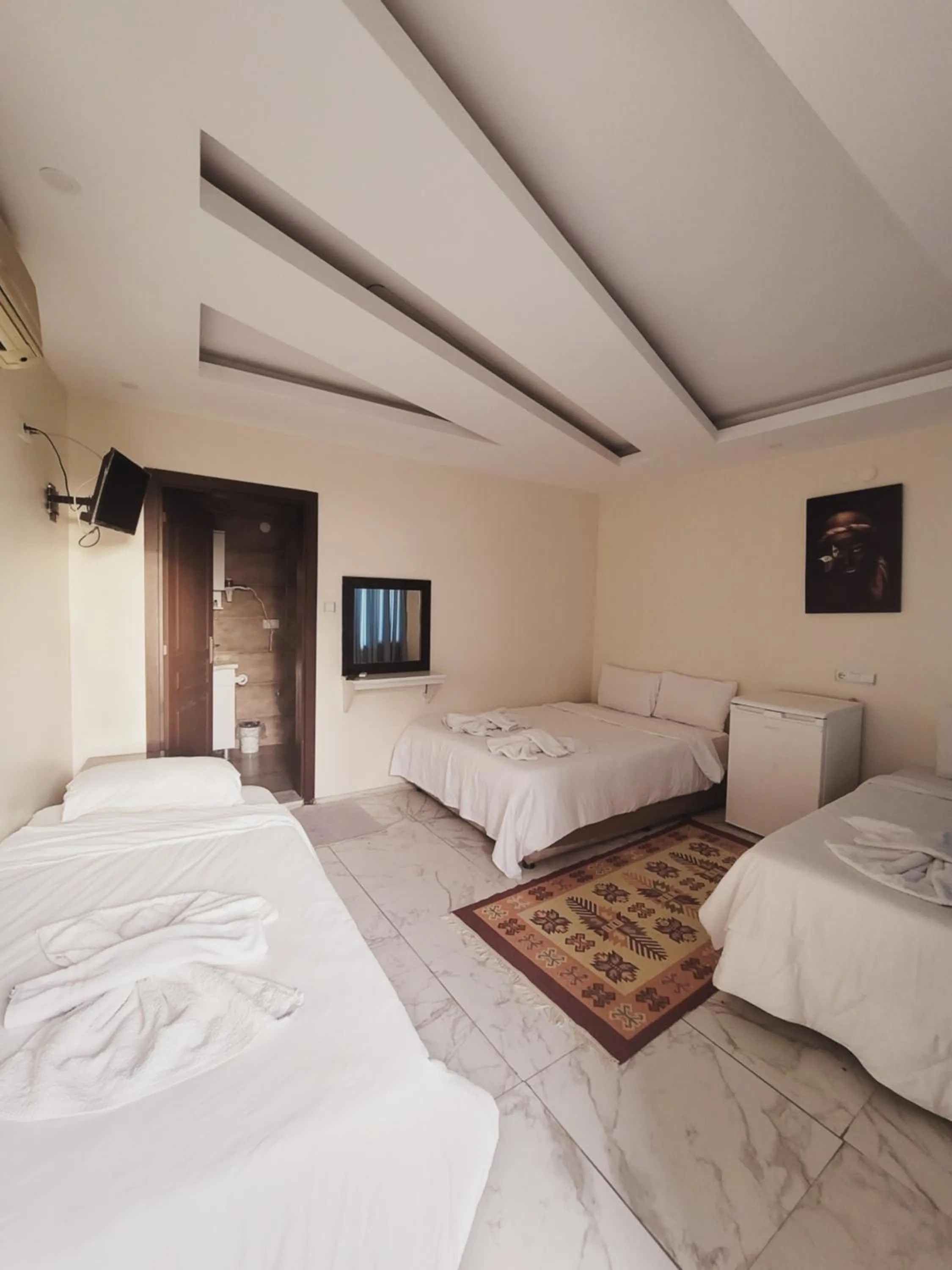 Bed in shah sultan Ozturk Hotel