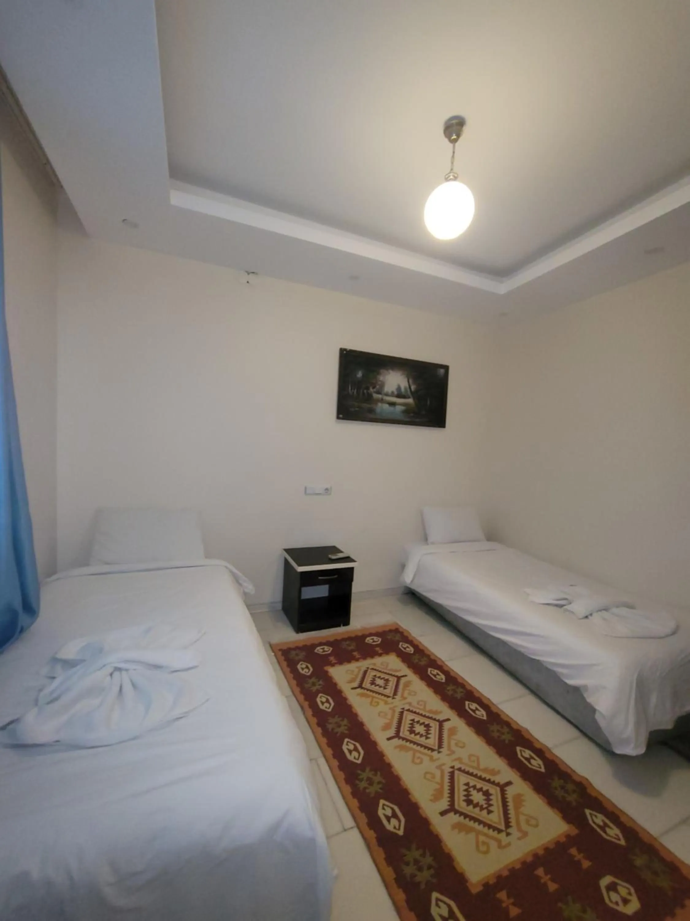 Bed in shah sultan Ozturk Hotel