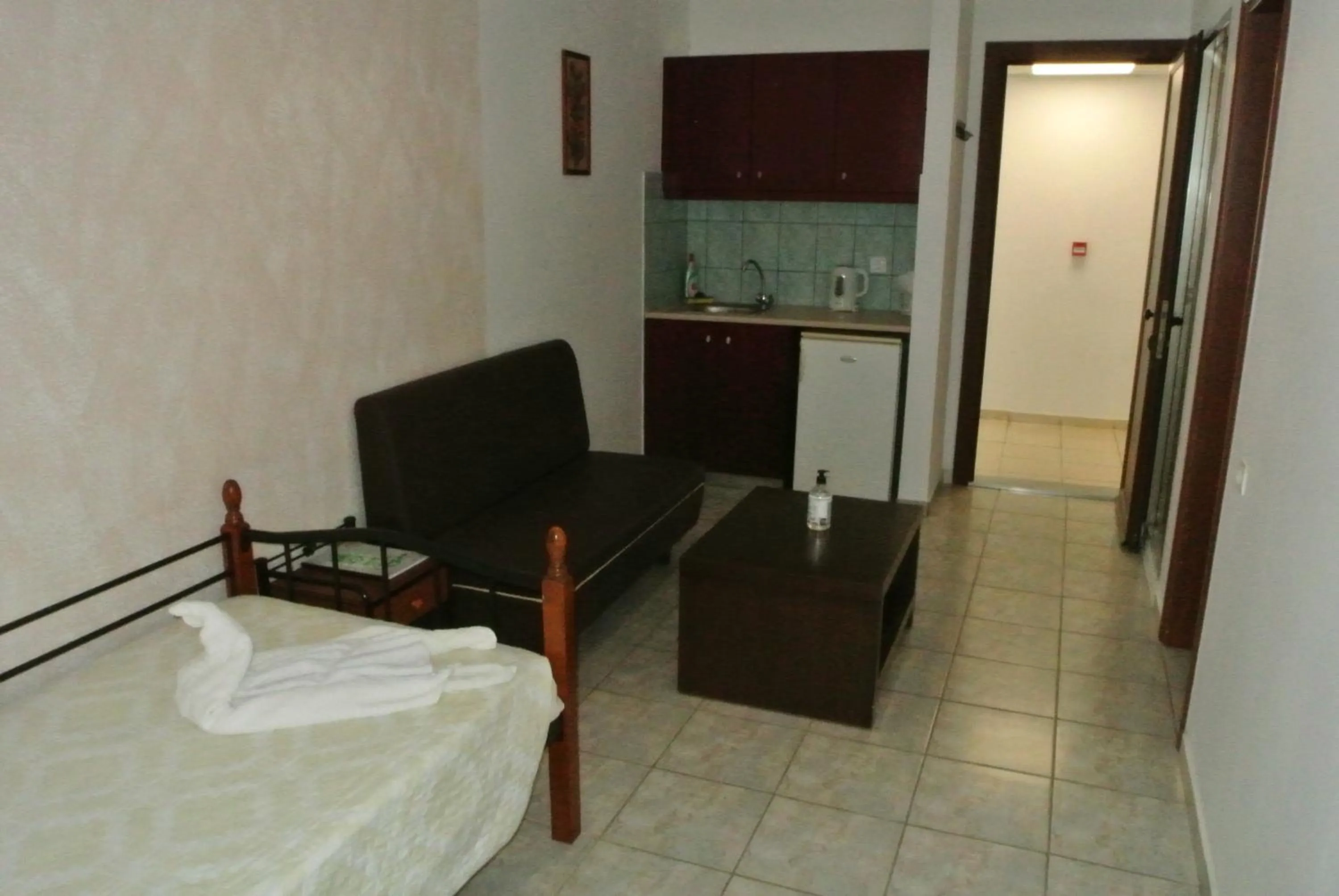 Seating area, Bed in Kokalakis Hotel