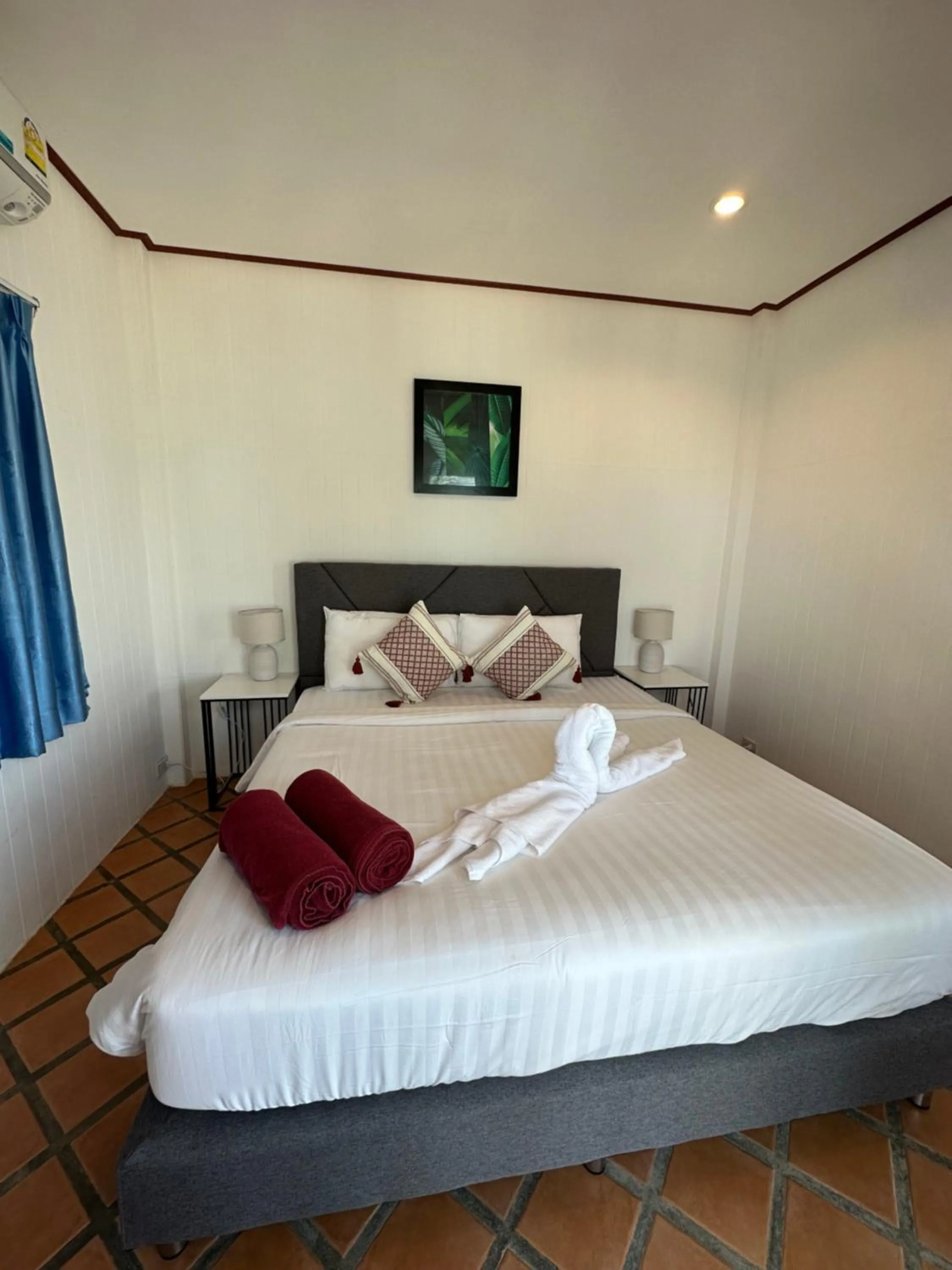 Bed in Bangrak Pier Bungalow