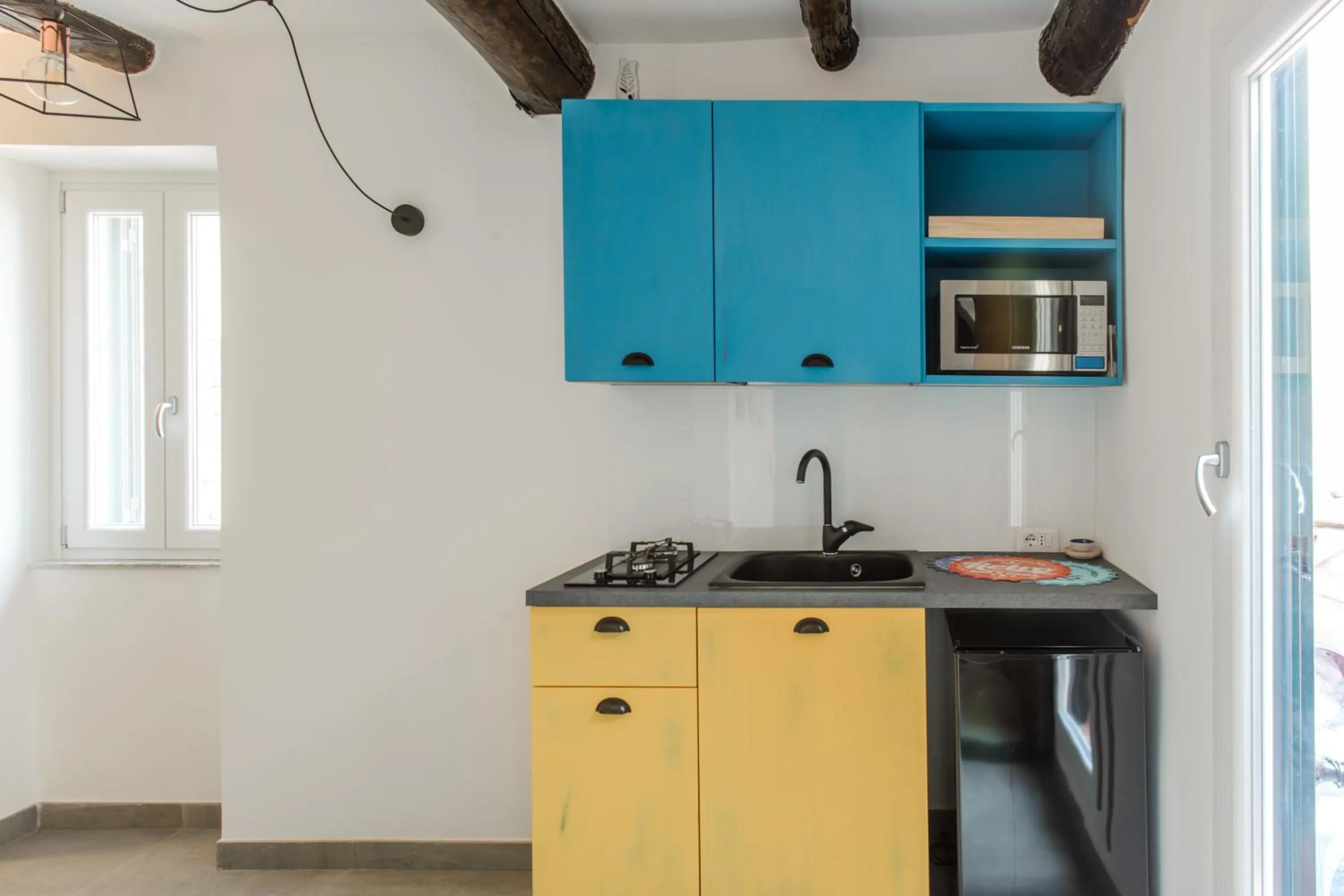 Kitchen or kitchenette in Napoli Suite Toledo 10 By Dimorra