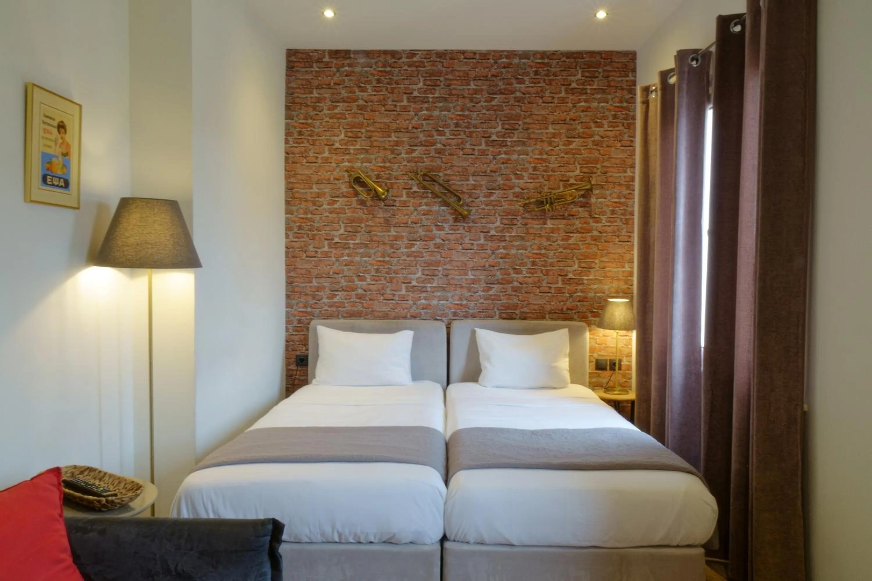 Bed in The Athens Version Luxury Suites