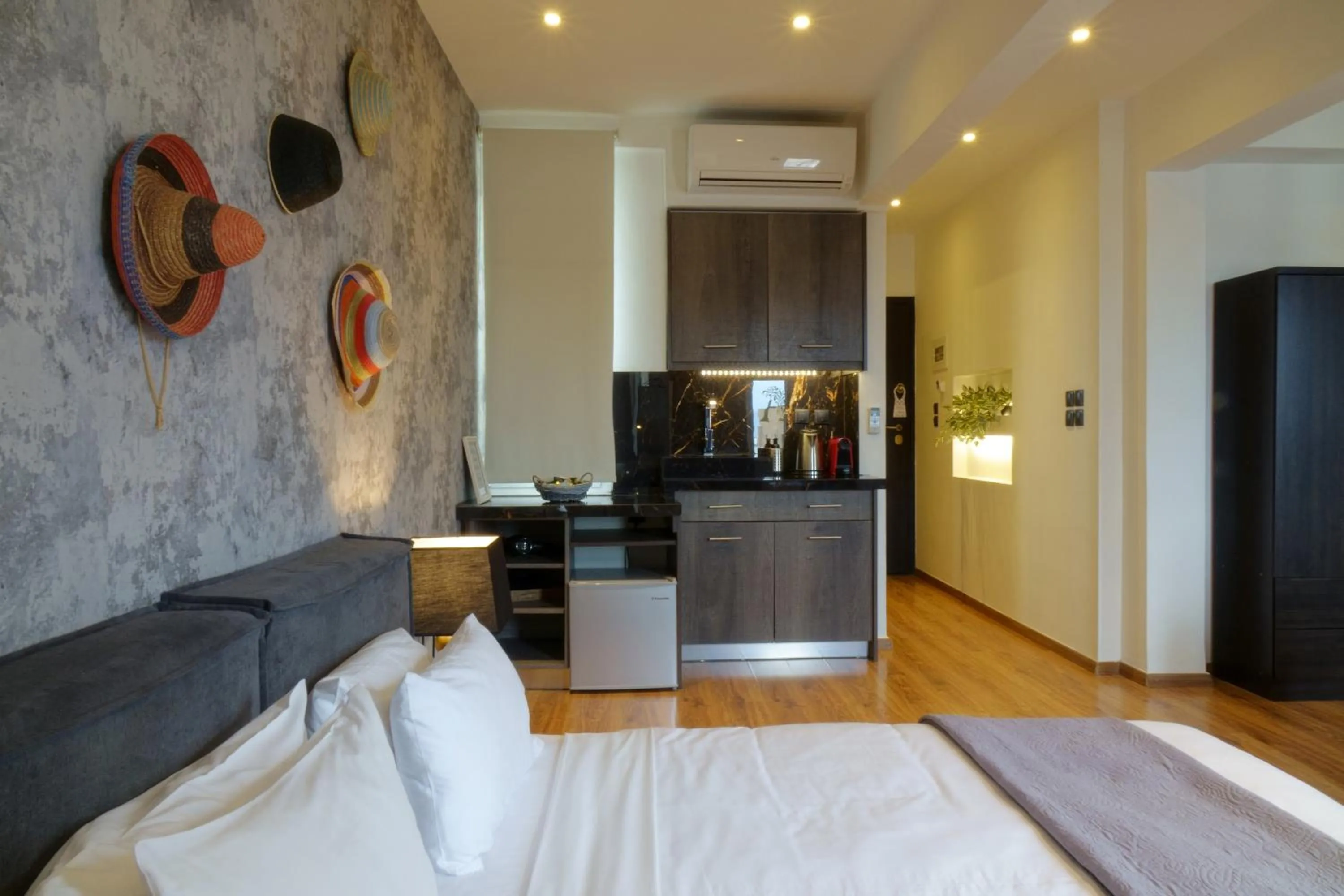 Bed in The Athens Version Luxury Suites