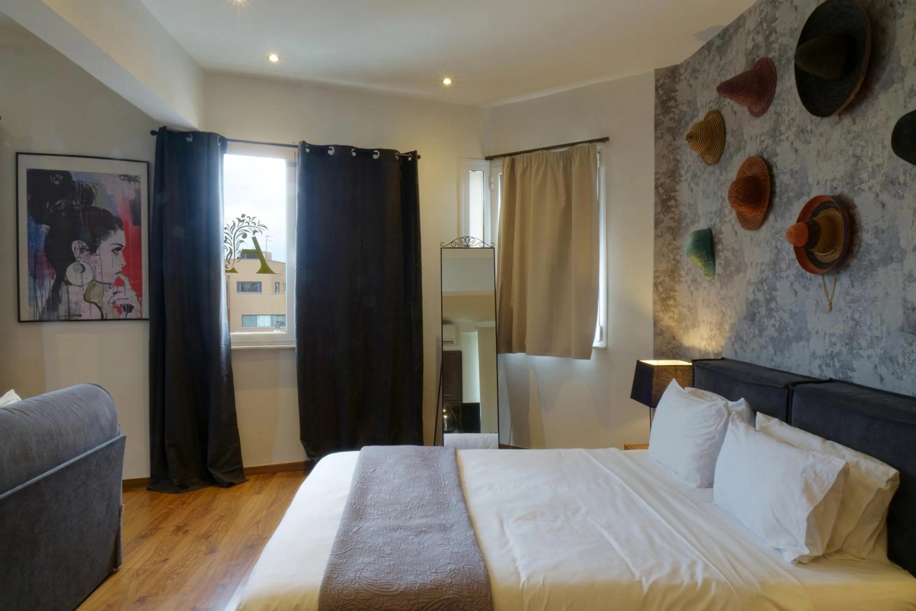 Bed in The Athens Version Luxury Suites