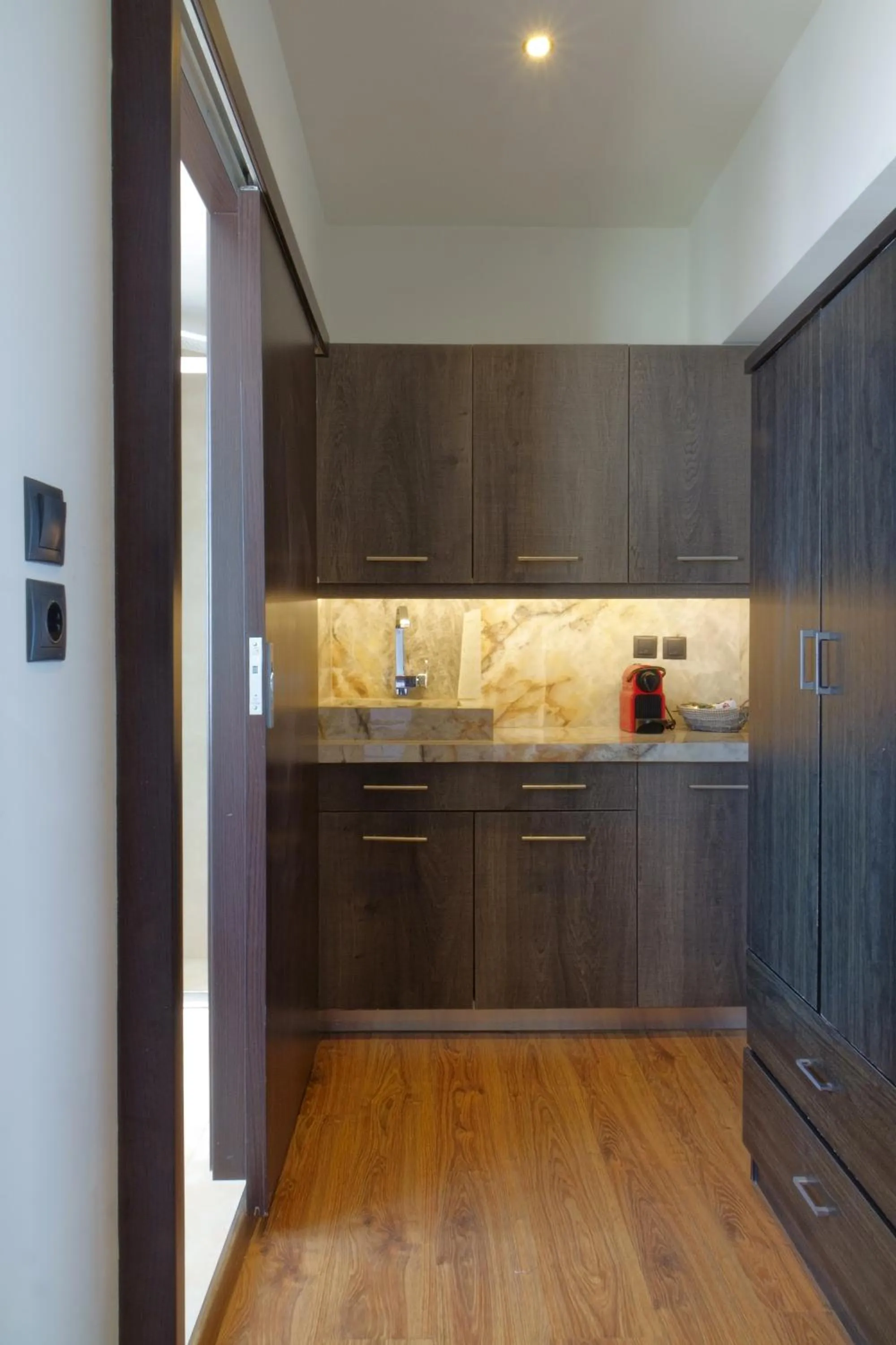Kitchen or kitchenette in The Athens Version Luxury Suites