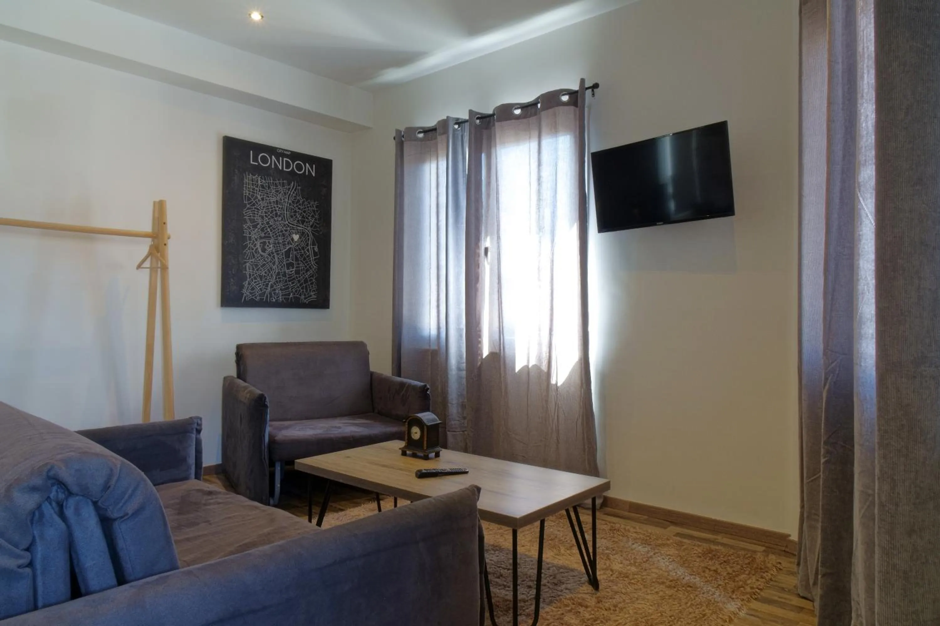 Living room in The Athens Version Luxury Suites