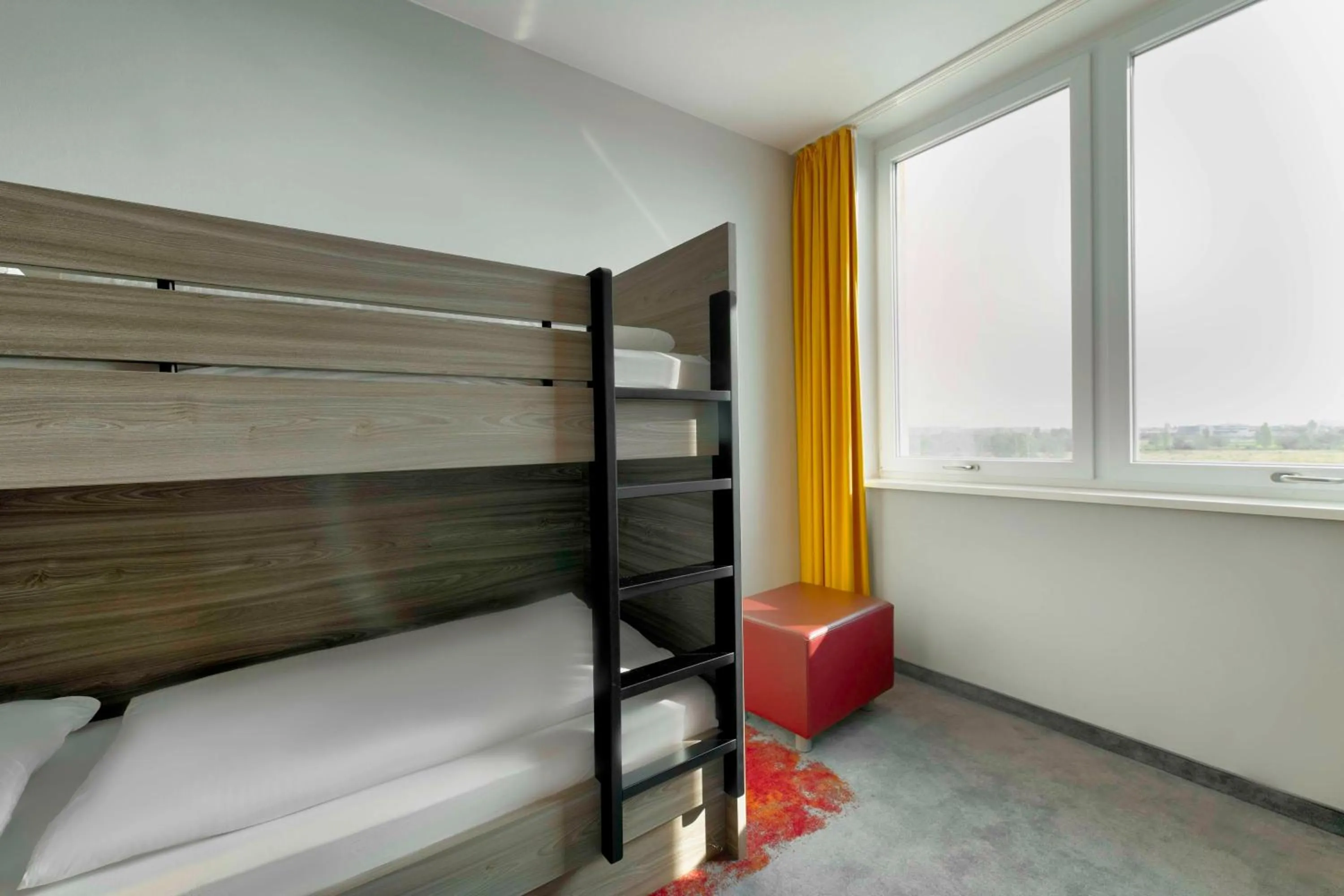 Bed in Campanile Berlin Brandenburg Airport