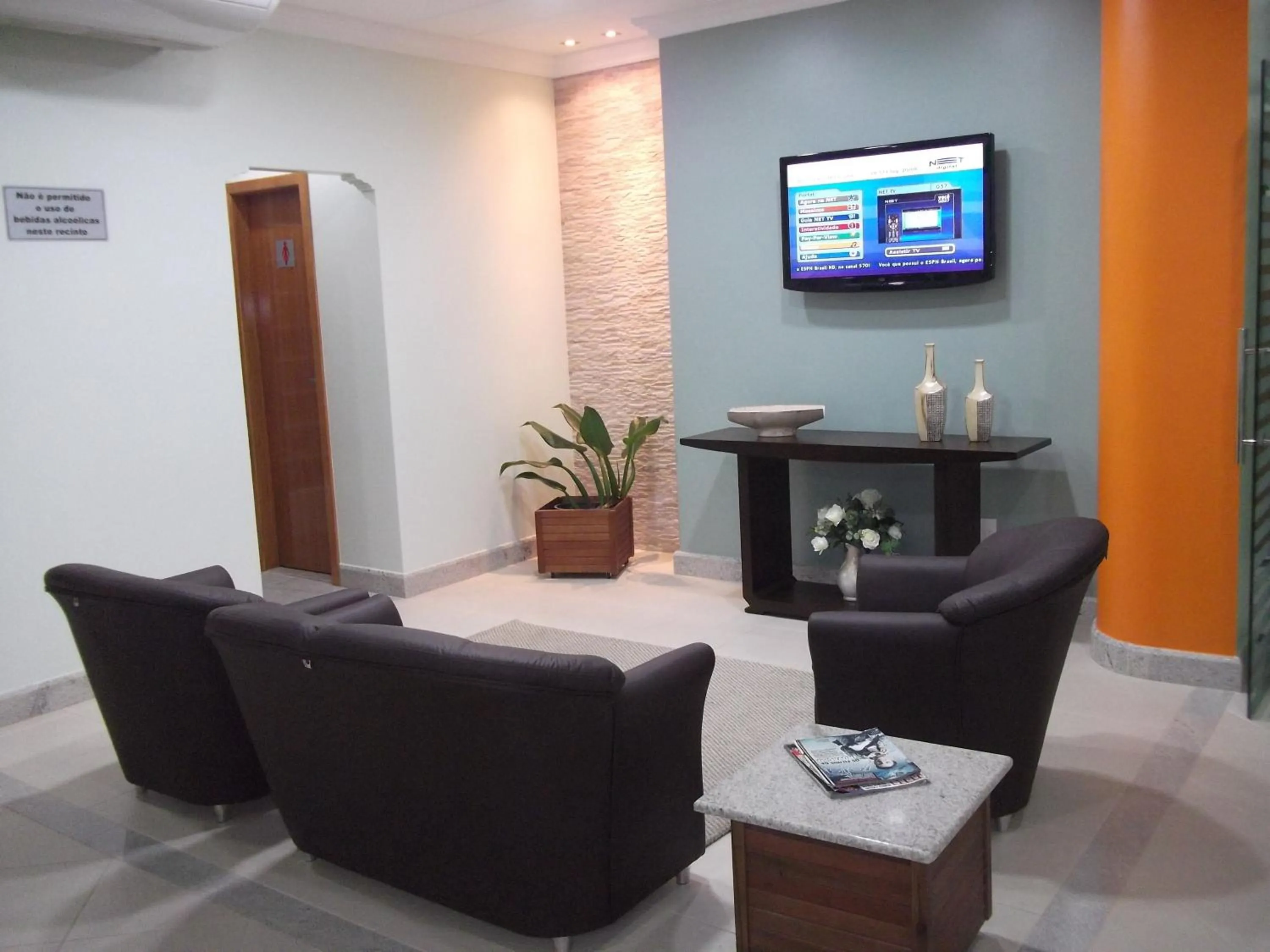 Communal lounge/ TV room in Lord Hotel Camburi