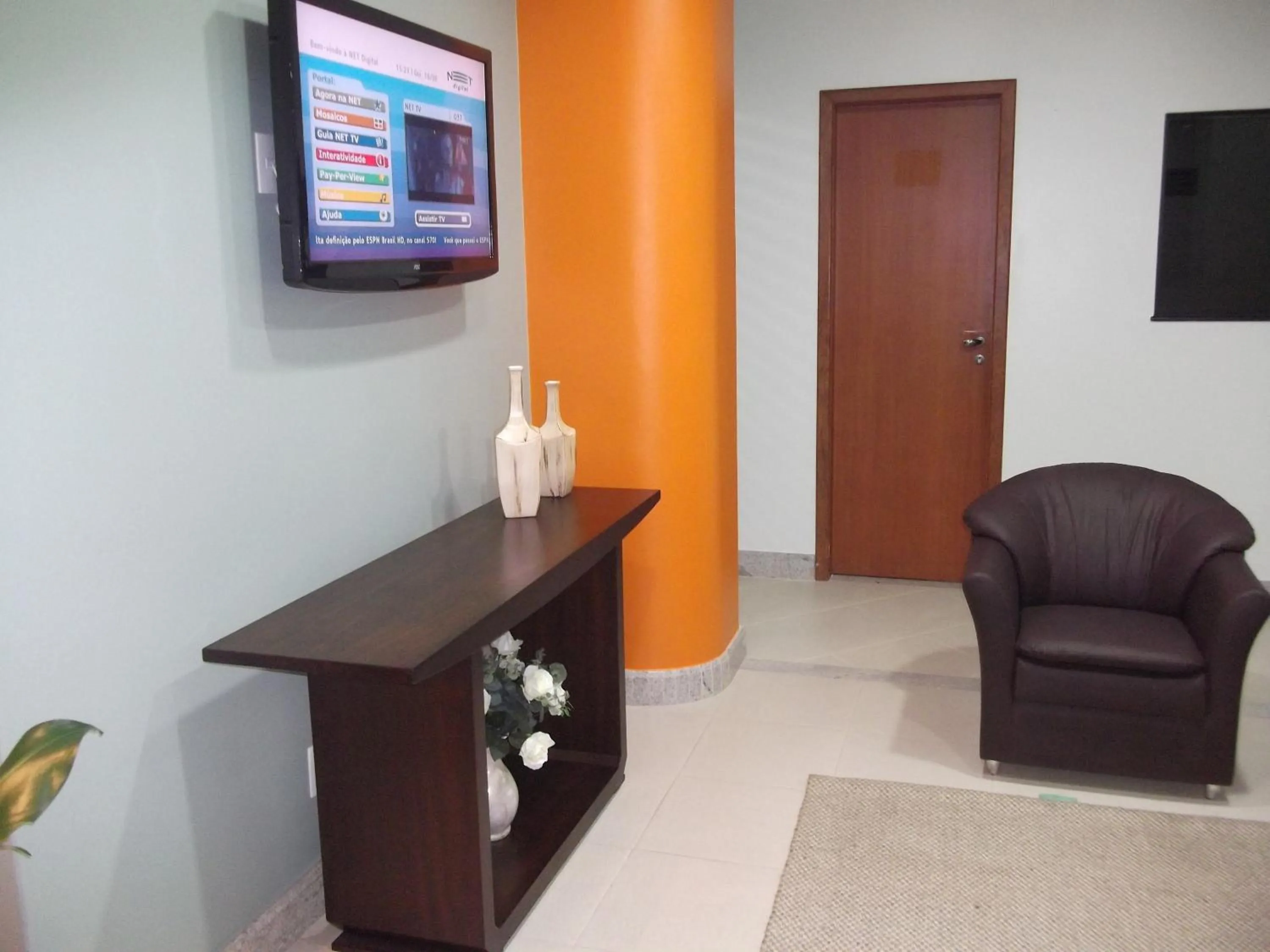 Communal lounge/ TV room in Lord Hotel Camburi