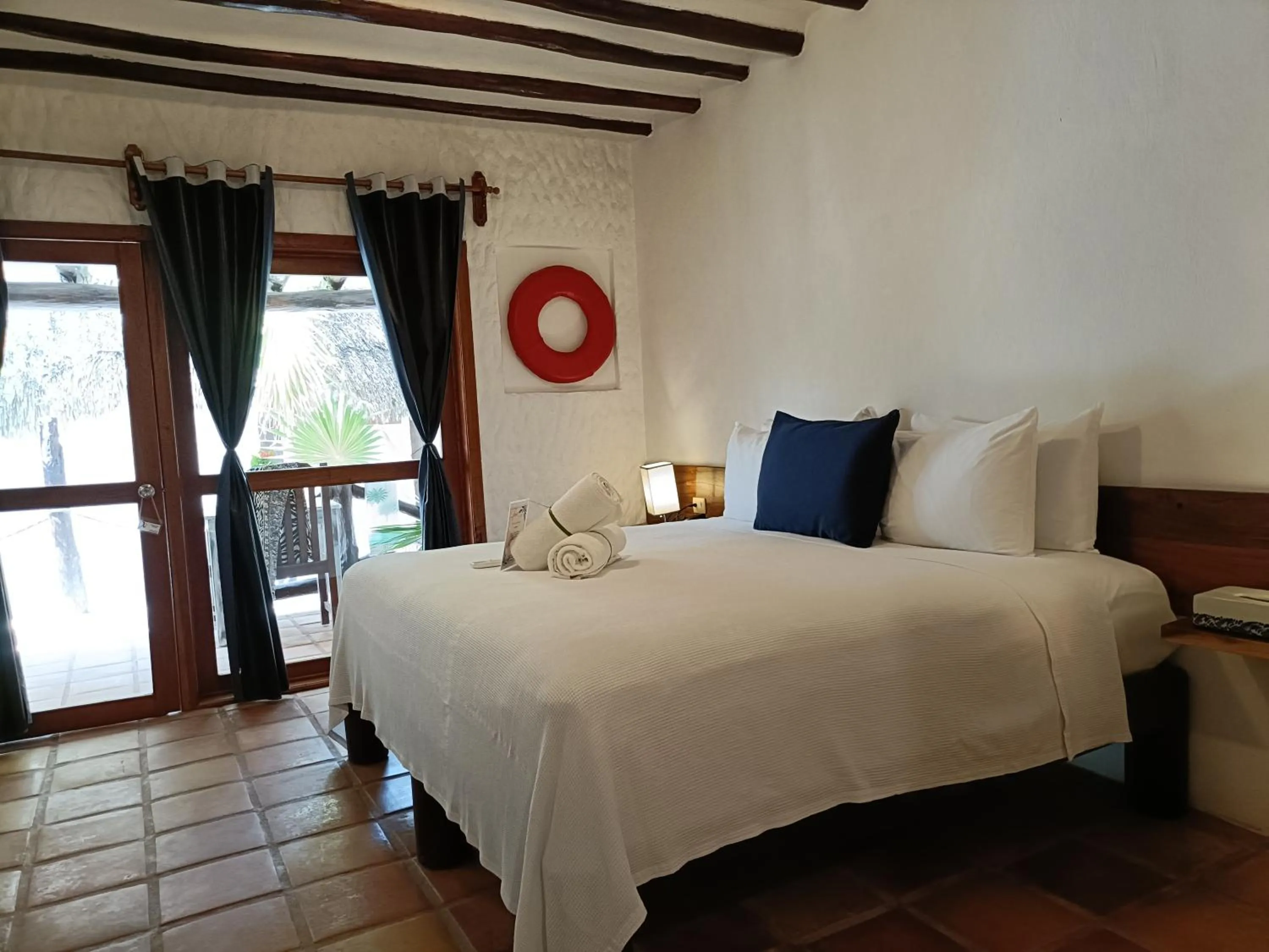 Photo of the whole room, Bed in Holbox by Xaloc