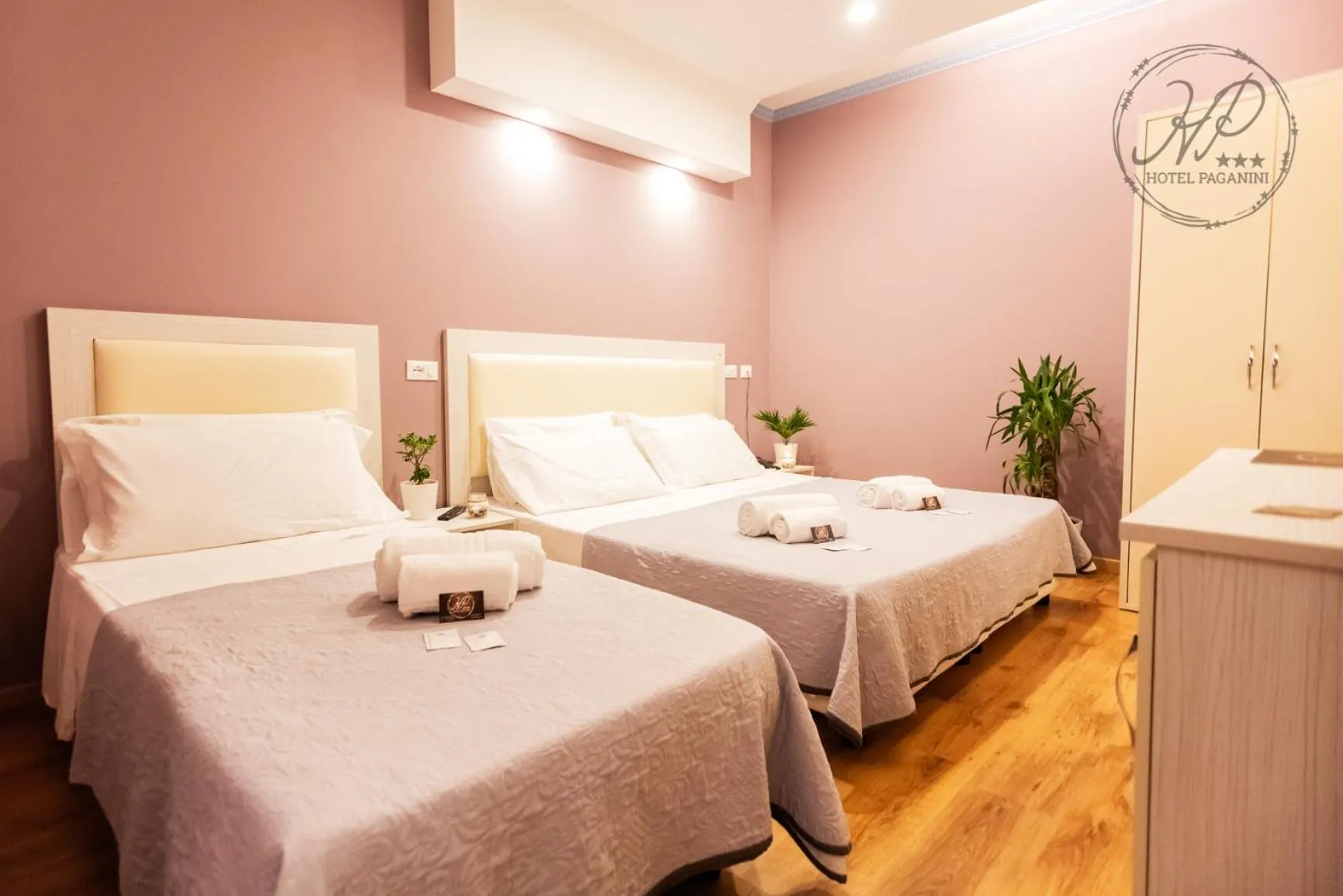 Property logo or sign, Bed in Hotel Paganini