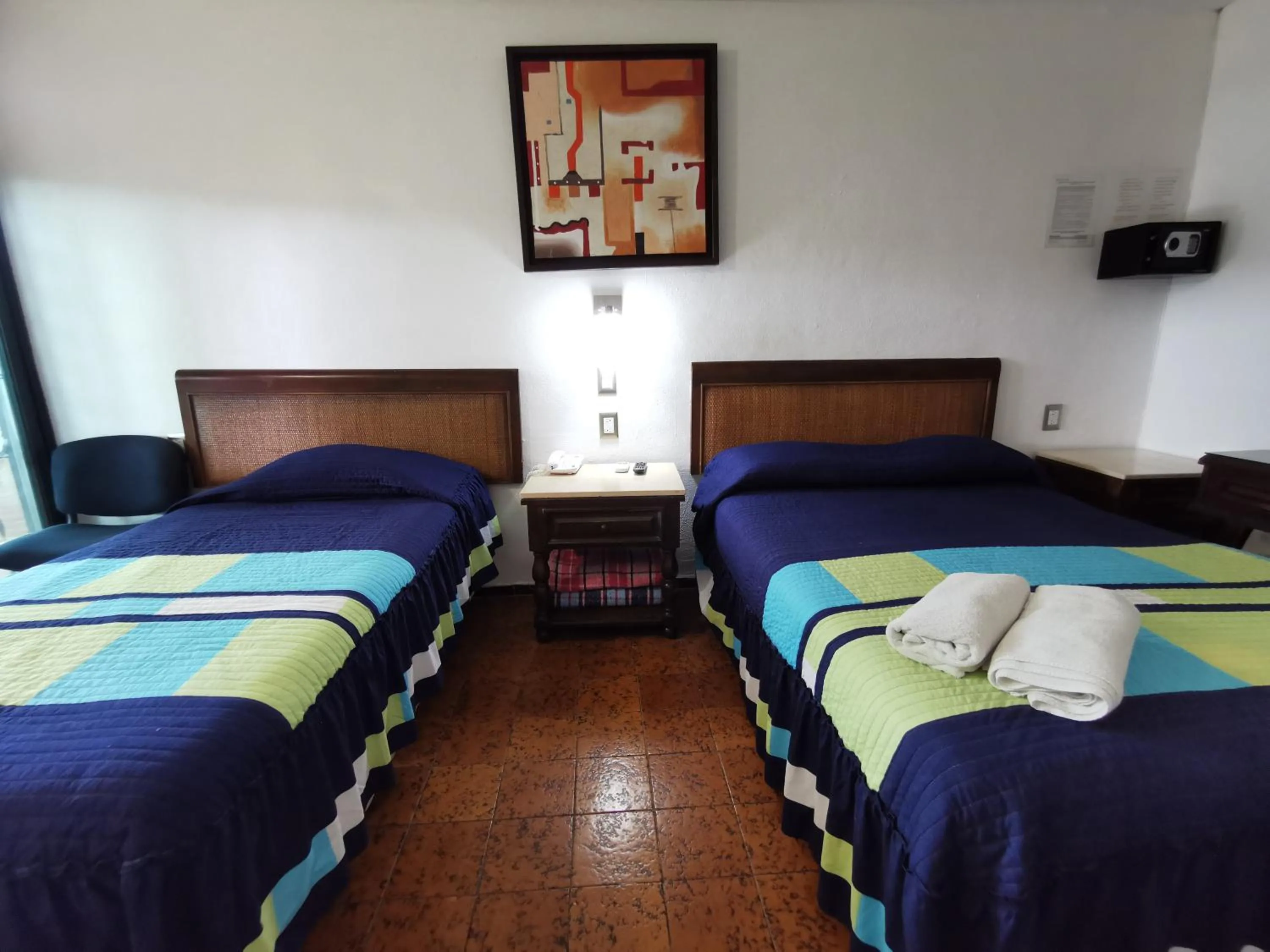 Bedroom, Bed in Hotel Doralba Inn