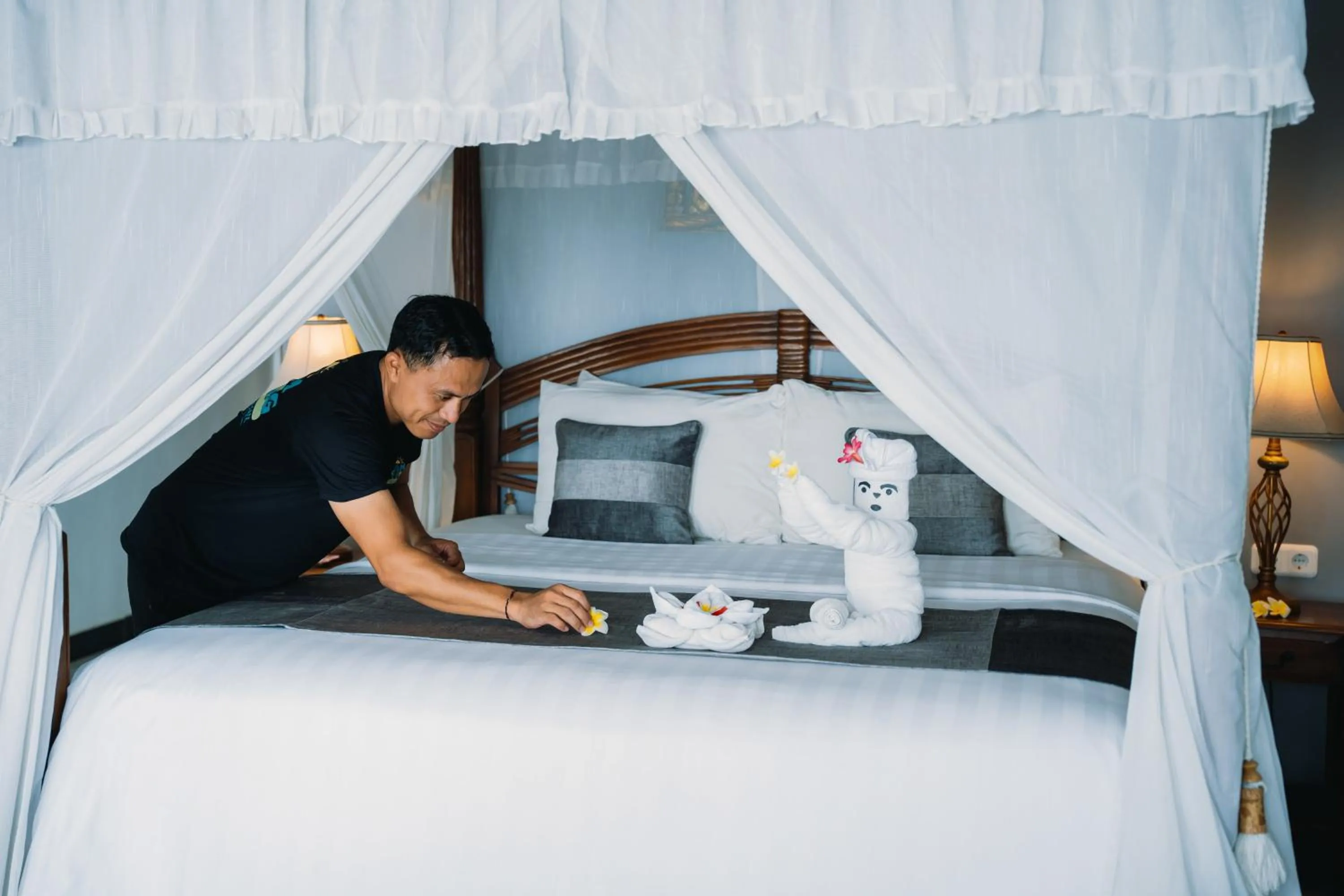 Bed in Puri Wirata Dive Resort and Spa Amed