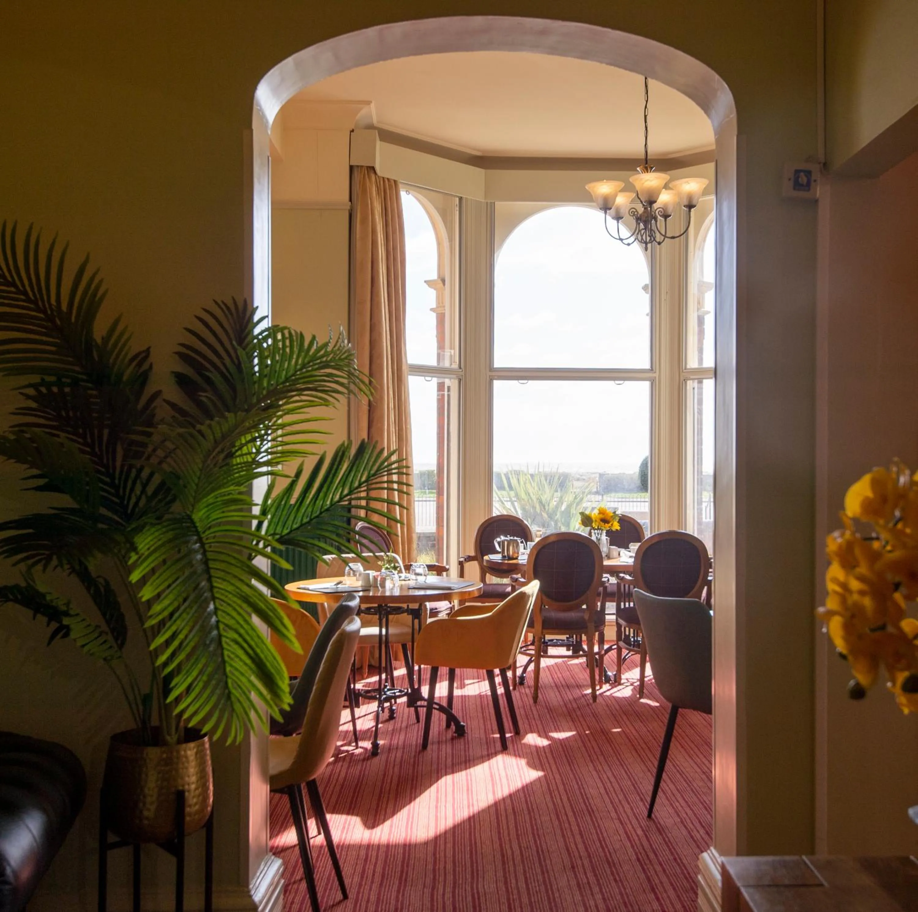 Dining area in Palm Court Hotel