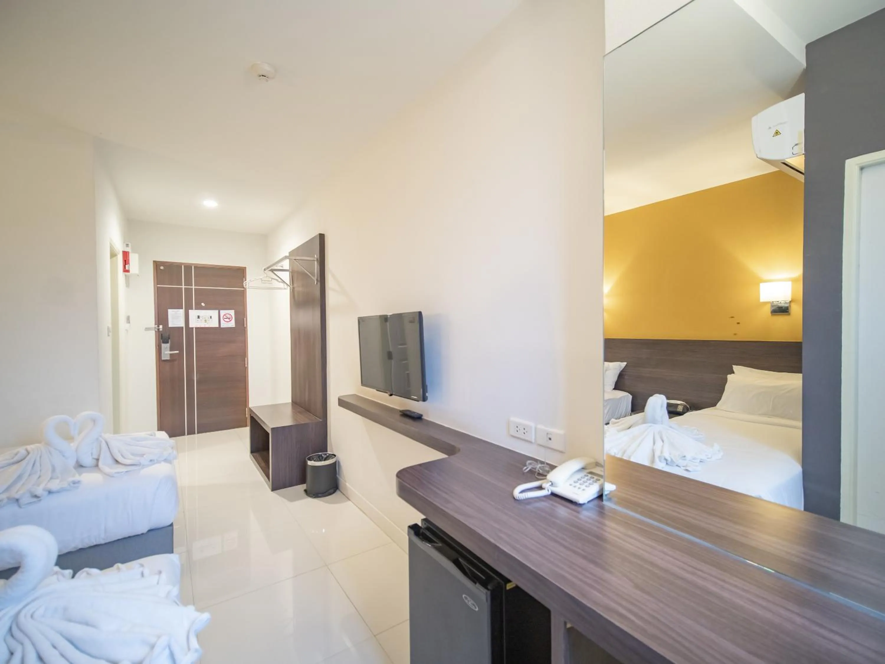 Bed in Fortune D Hotel Loei