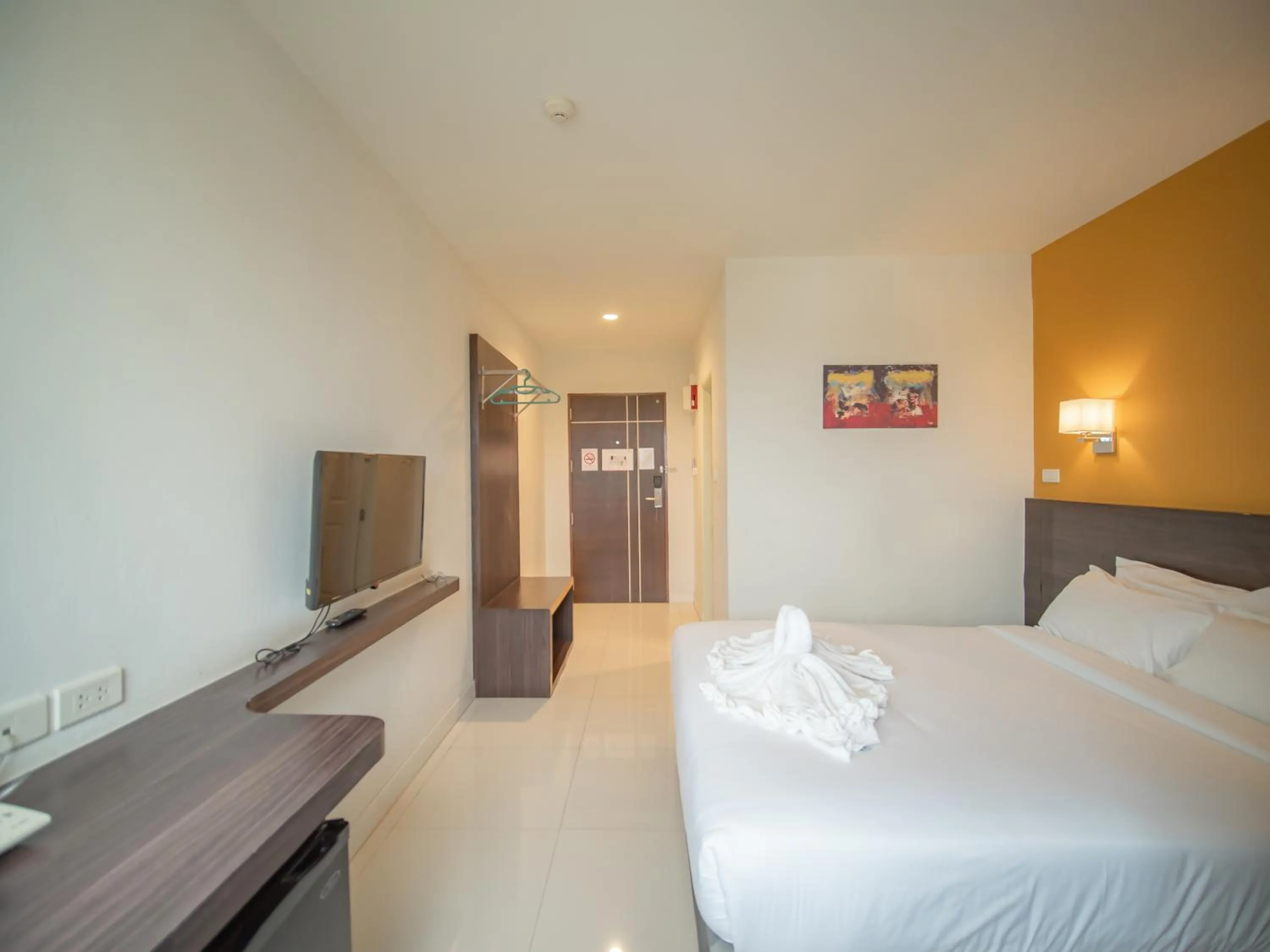 Bed in Fortune D Hotel Loei