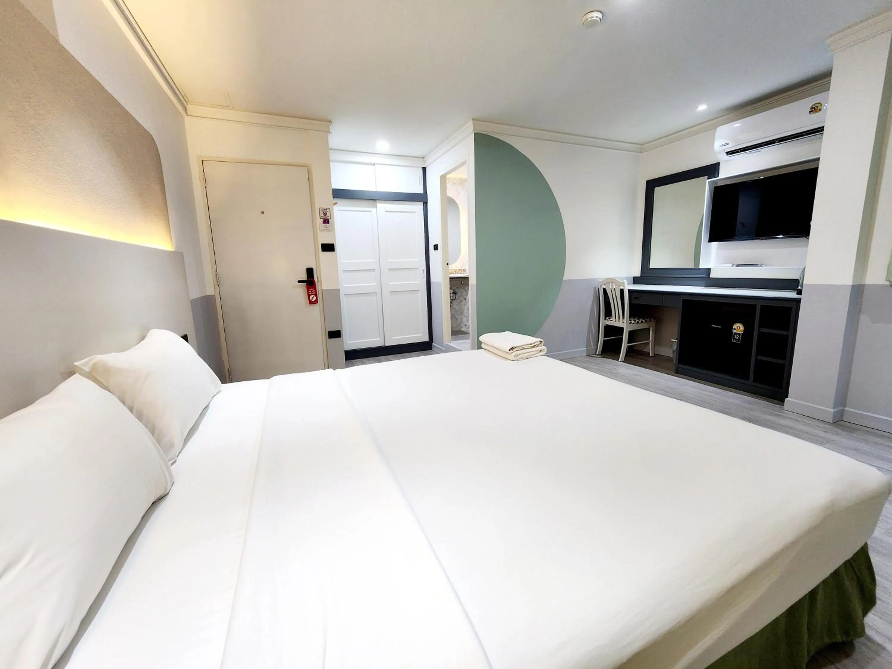 Bed in The Green Mansion Hotel - Patong Beach