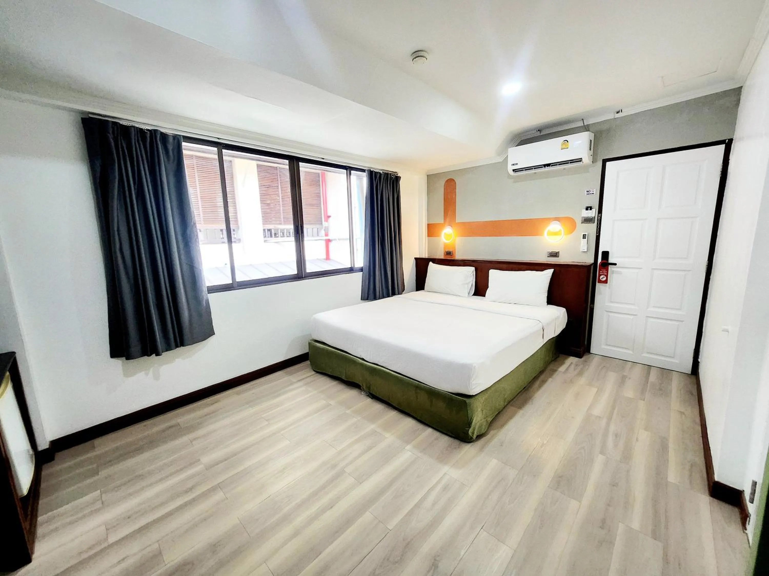 Bed in The Green Mansion Hotel - Patong Beach