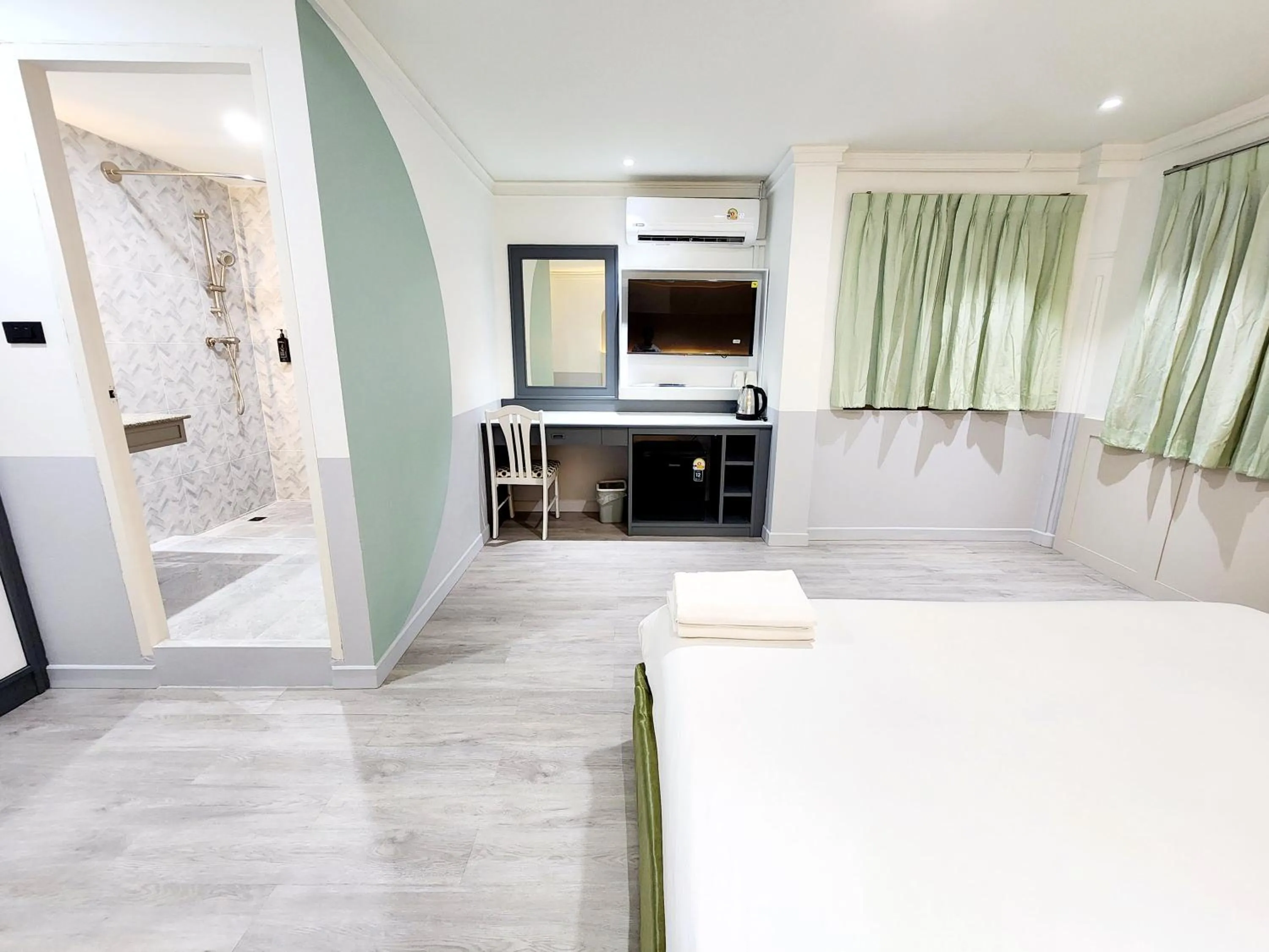 Bed in The Green Mansion Hotel - Patong Beach