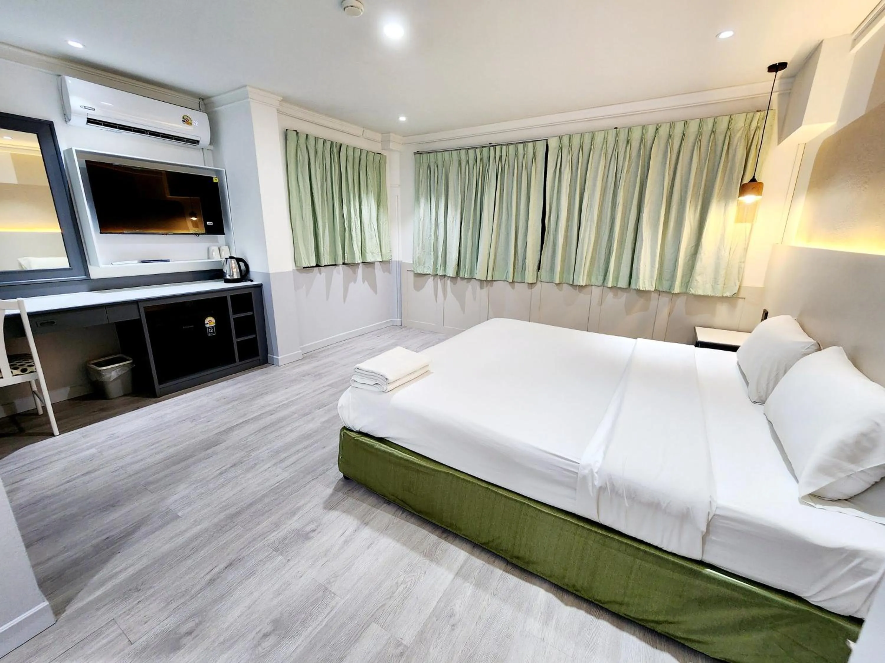 Bed in The Green Mansion Hotel - Patong Beach
