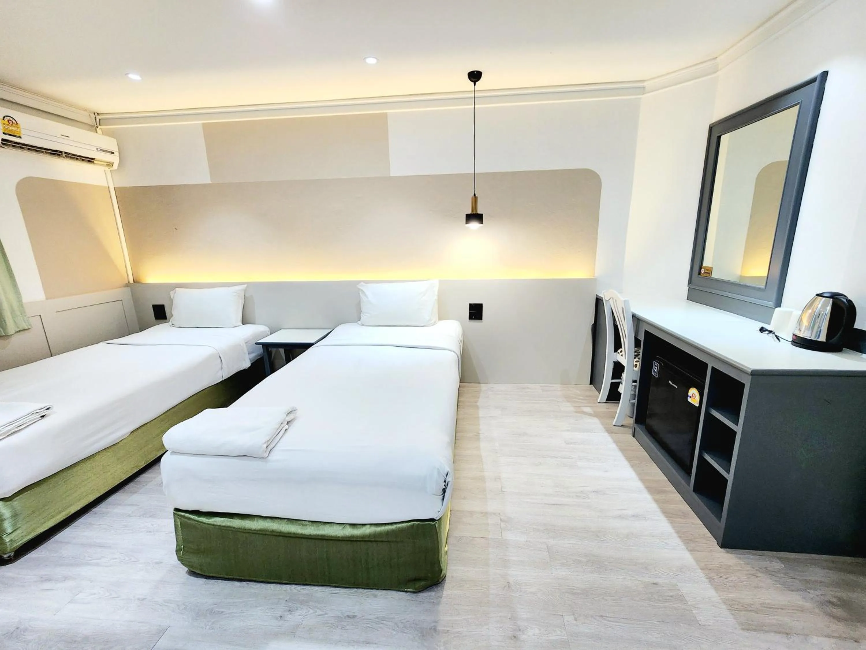 Bed in The Green Mansion Hotel - Patong Beach