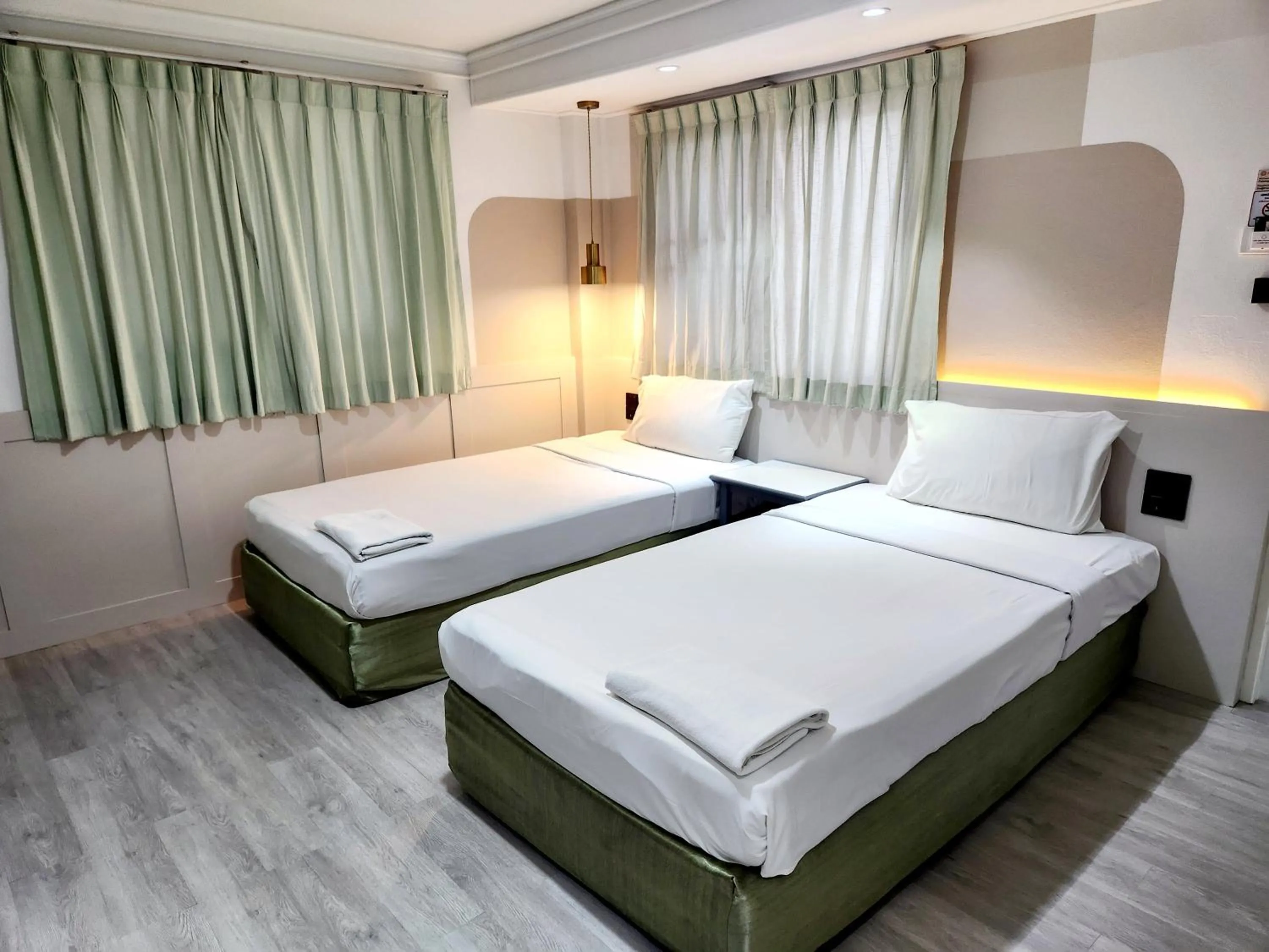 Bed in The Green Mansion Hotel - Patong Beach