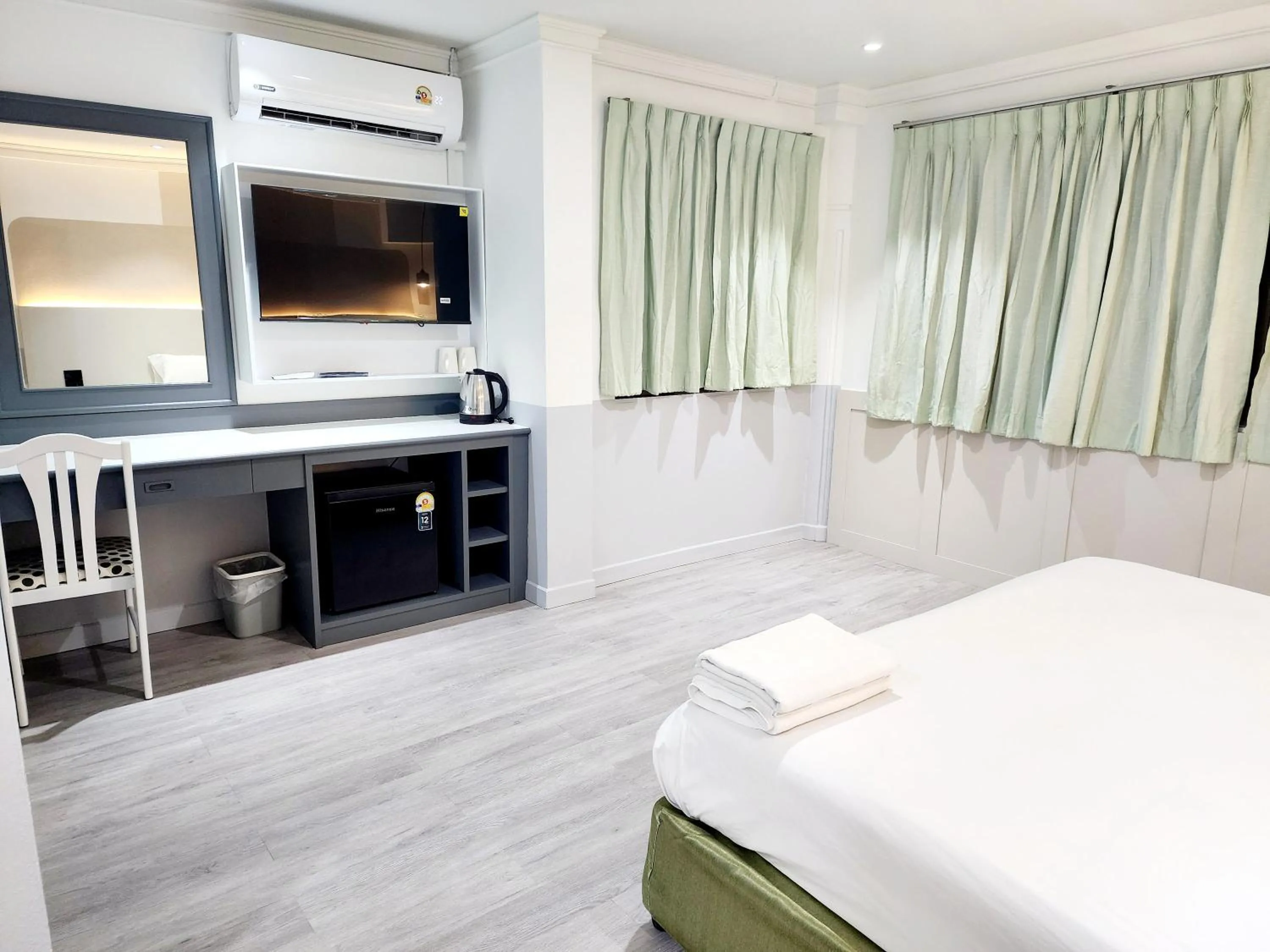 Bed in The Green Mansion Hotel - Patong Beach