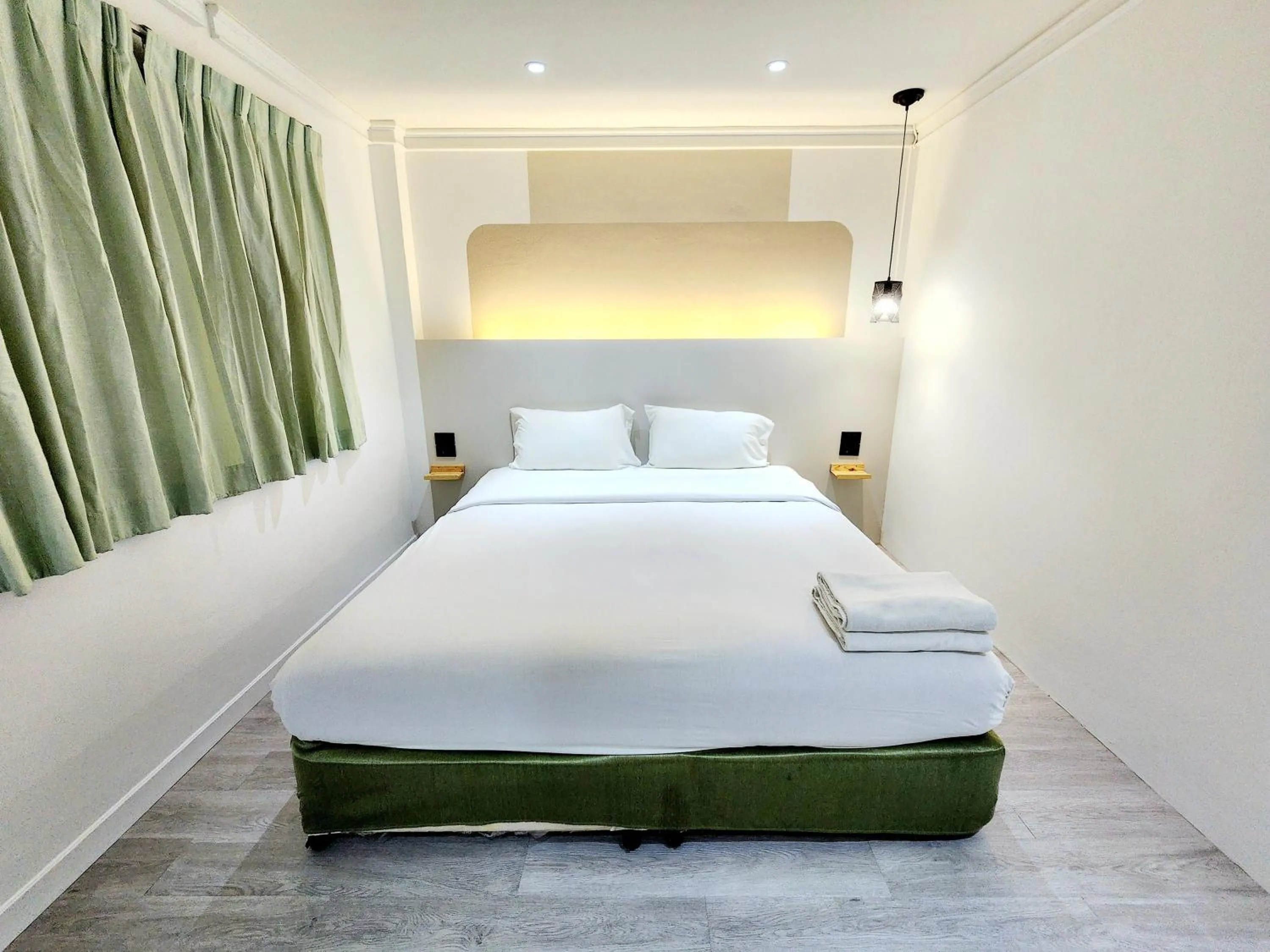 Bed in The Green Mansion Hotel - Patong Beach