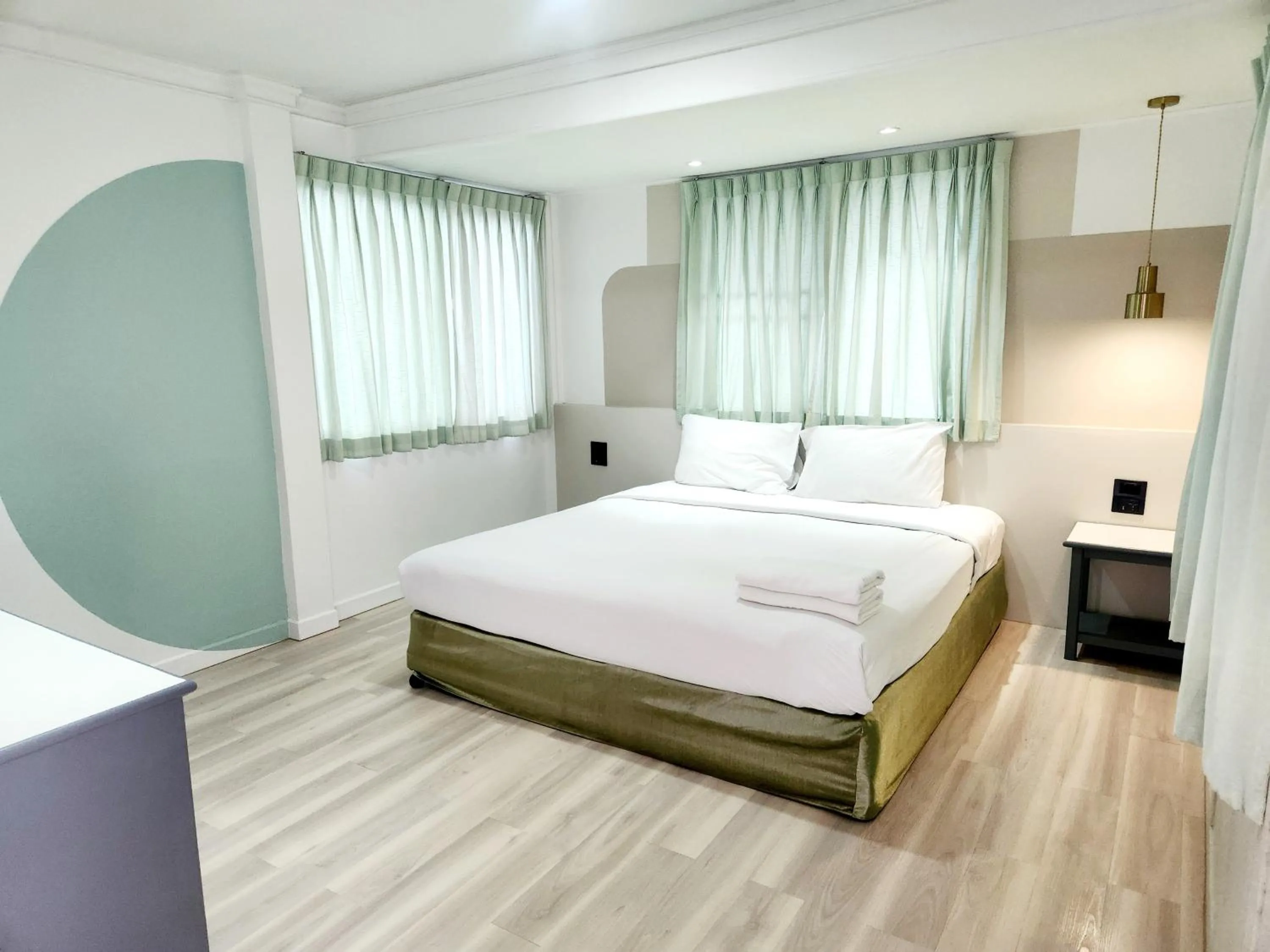 Bed in The Green Mansion Hotel - Patong Beach