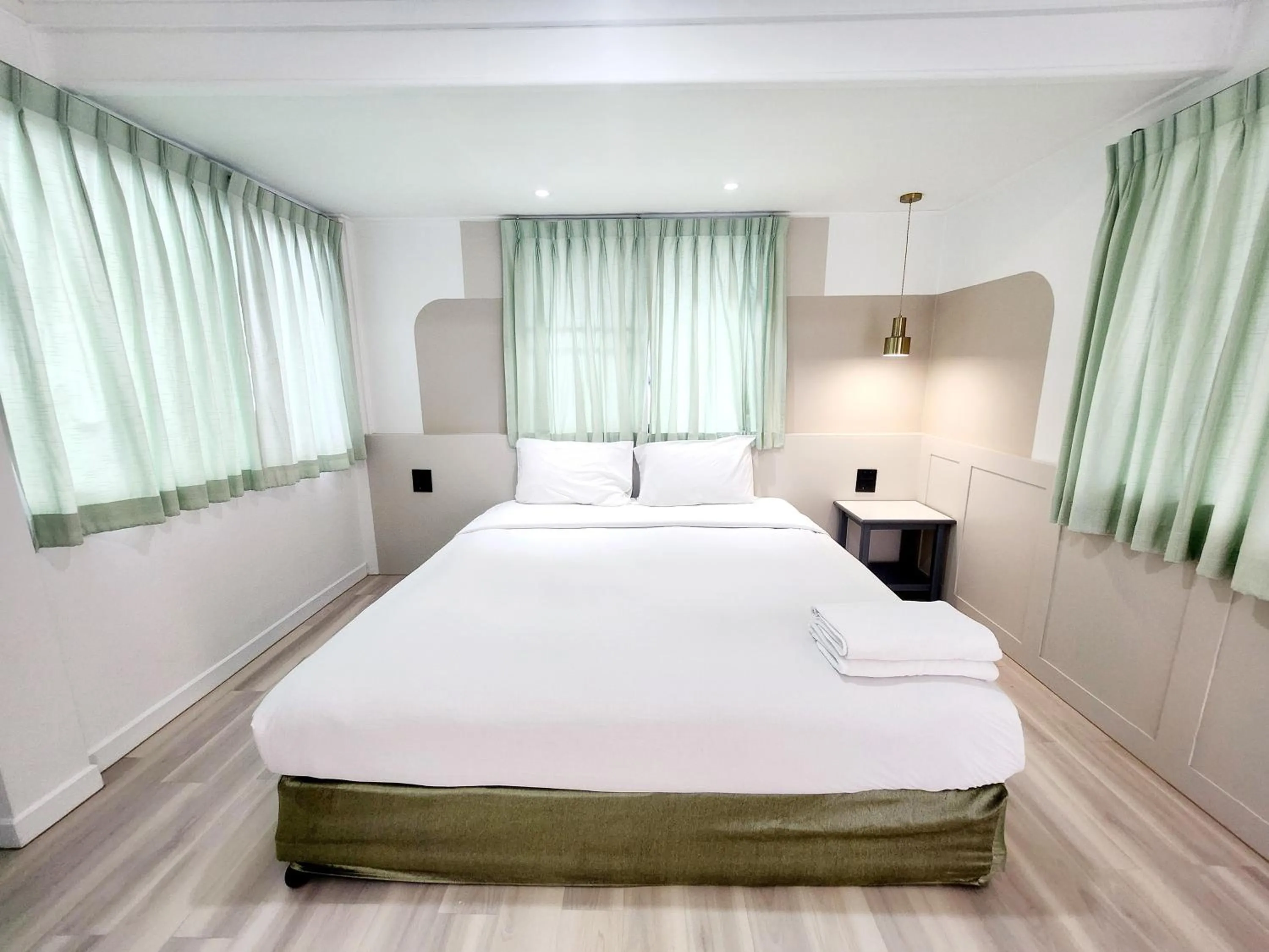 Bed in The Green Mansion Hotel - Patong Beach