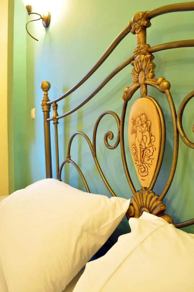 Bed in Areos Polis Boutique Hotel