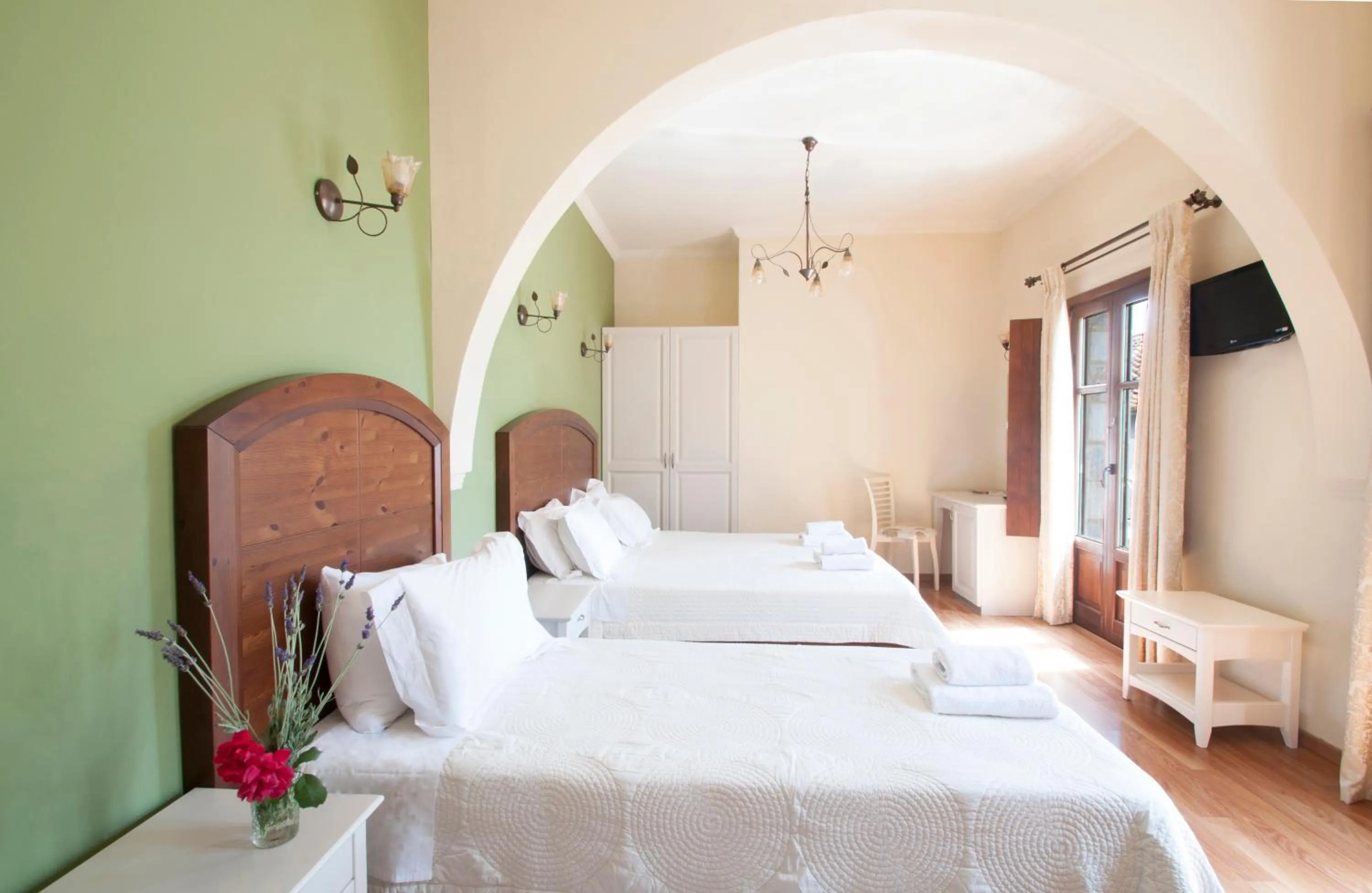 Bed in Areos Polis Boutique Hotel