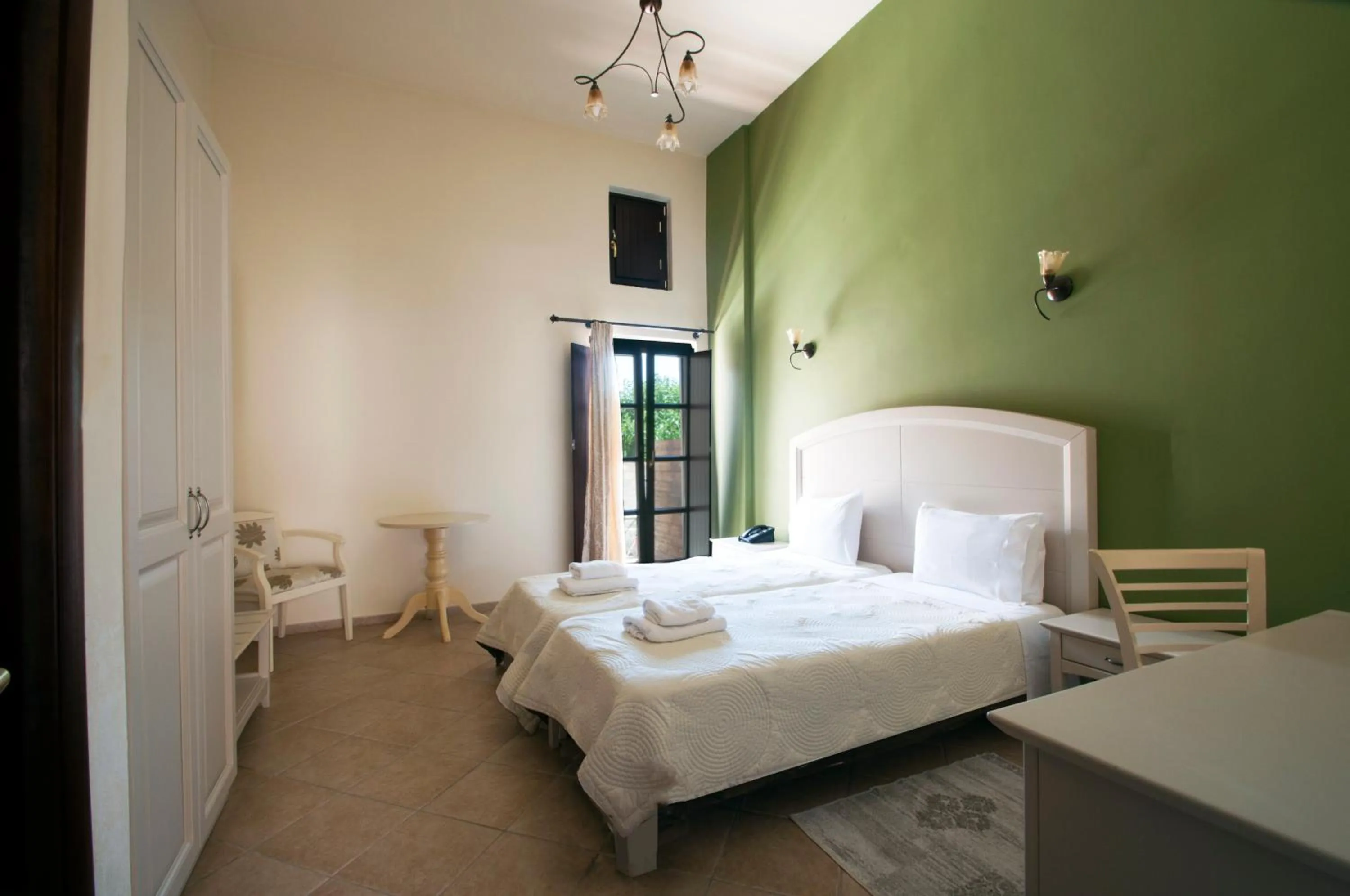 Bed in Areos Polis Boutique Hotel